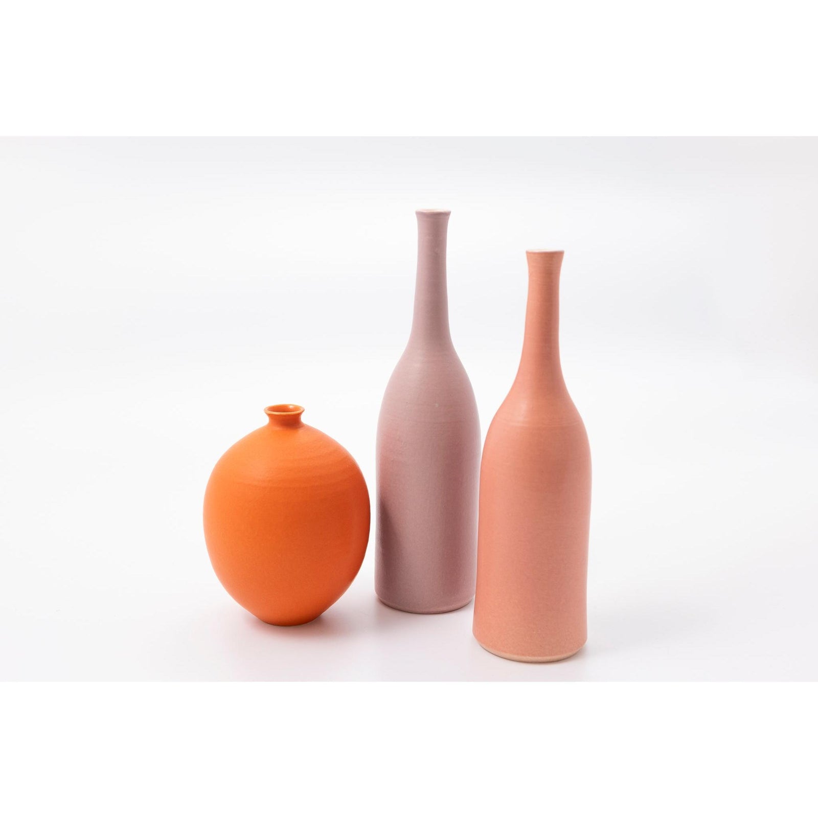 'LB207 Orange oval vase' by Lucy Burley ceramics, available at Padstow Gallery, Cornwall