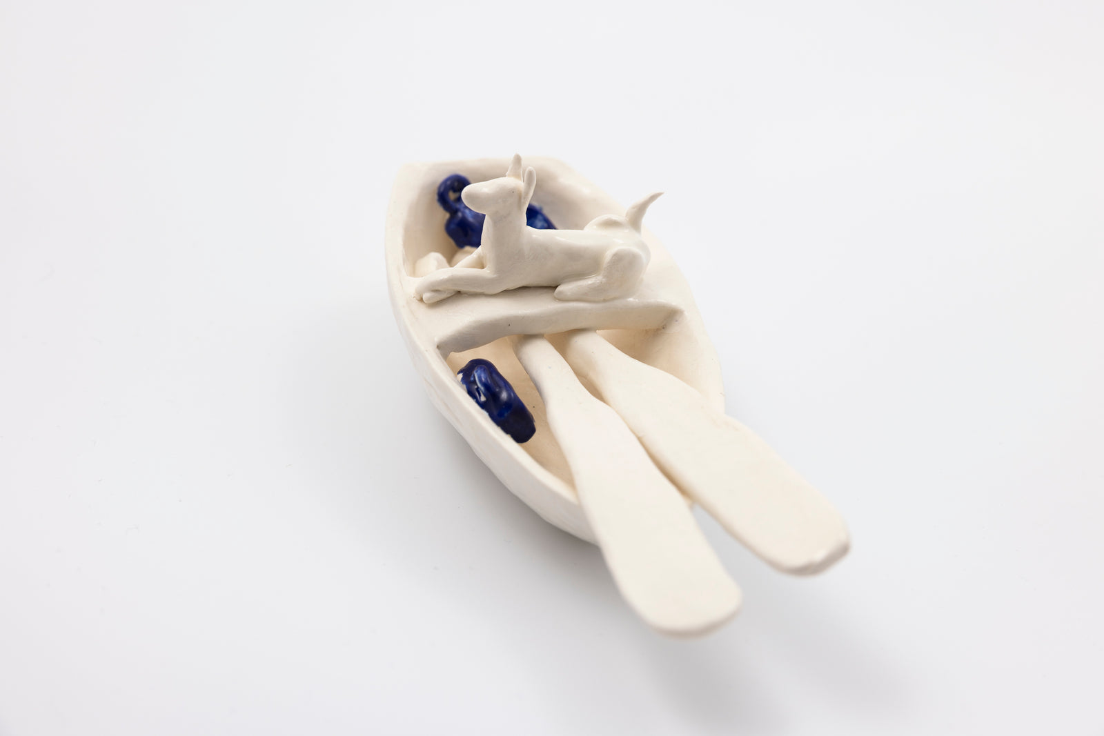 'Blue and White Dog (SH50)' Stoneware Boat by Sophie Howard, available from Padstow Gallery, Cornwall