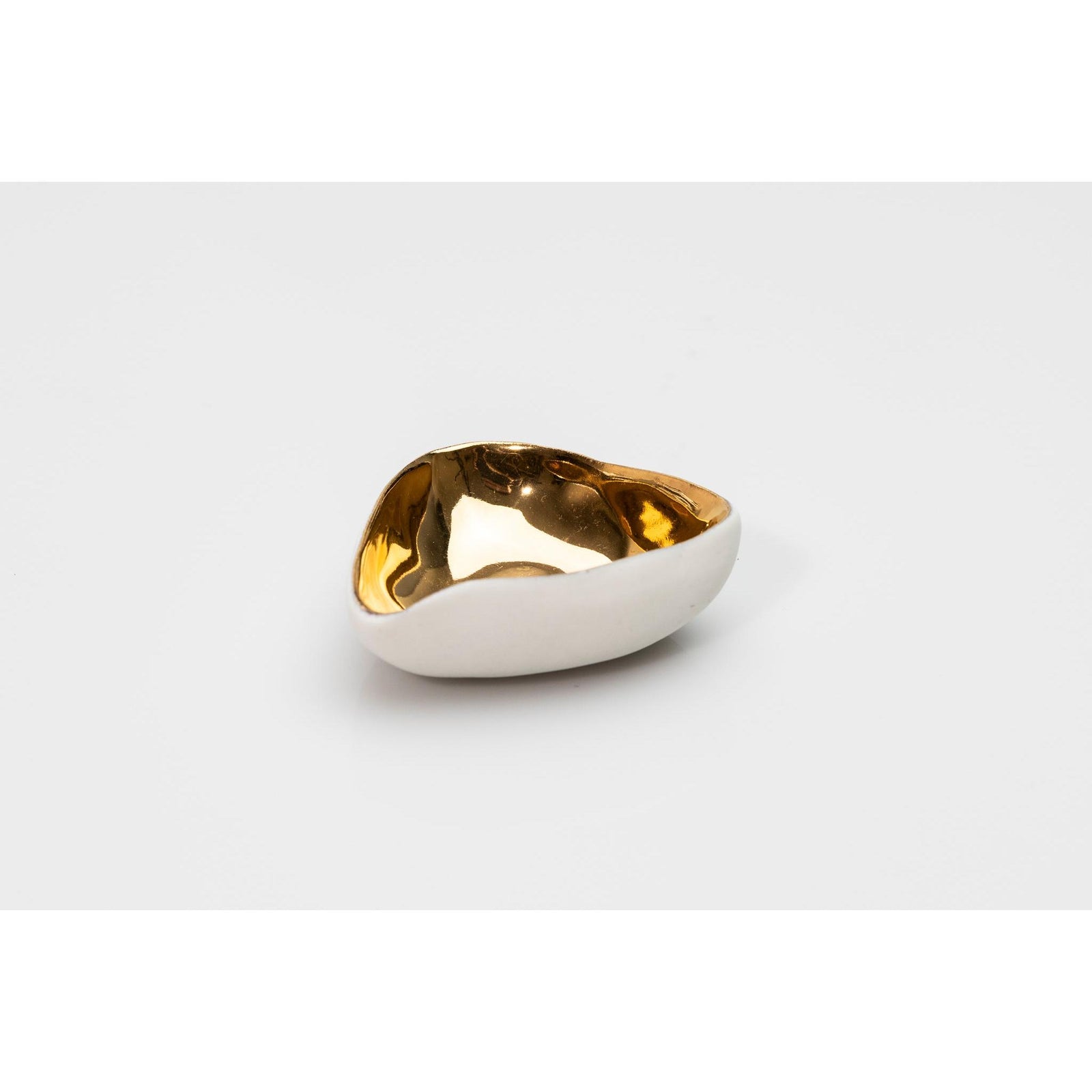 PL08 Shallow Three Sided Bowl, white porcelain and gold lustre by Penny Little. Available at Padstow Gallery, Cornwall