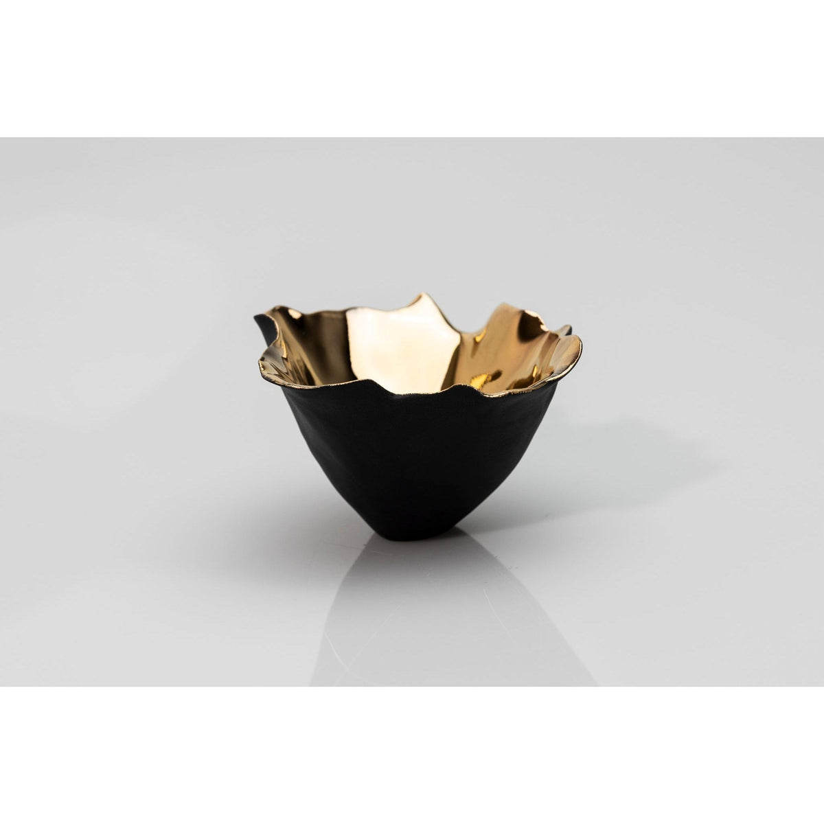 PL01 Tulip 1, black porcelain and gold lustre by Penny Little. Available at Padstow Gallery, Cornwall