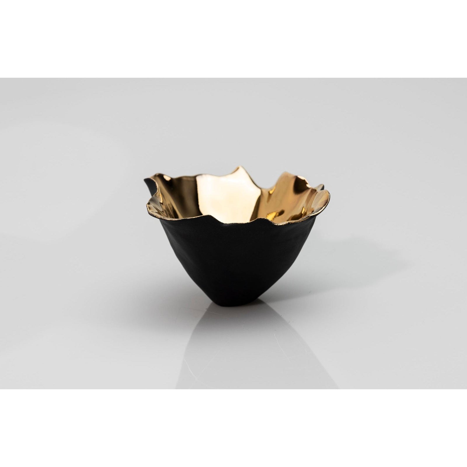 PL01 Tulip 1, black porcelain and gold lustre by Penny Little. Available at Padstow Gallery, Cornwall