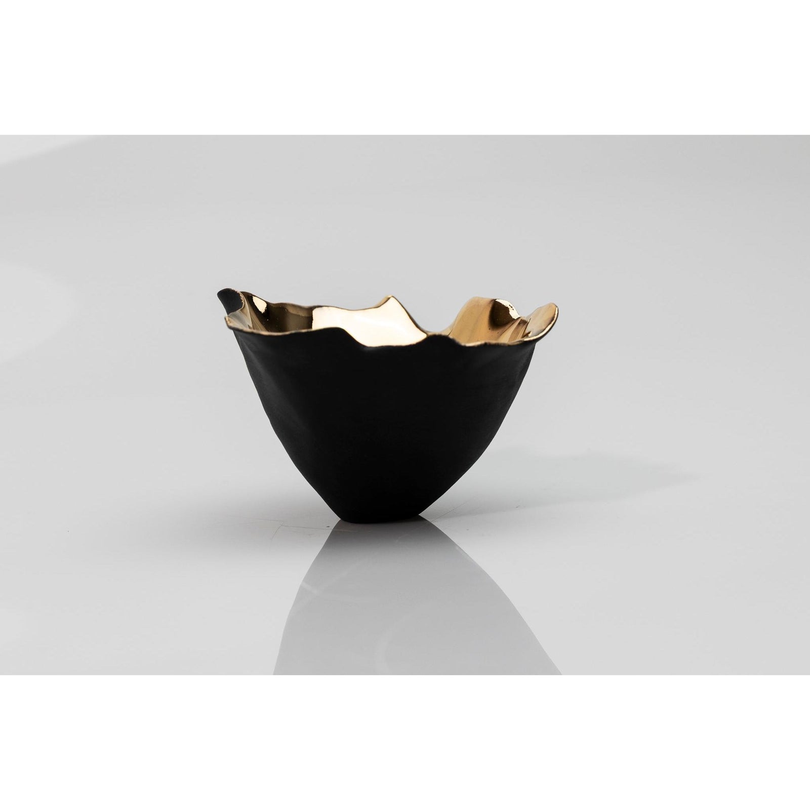 PL01 Tulip 1, black porcelain and gold lustre by Penny Little. Available at Padstow Gallery, Cornwall