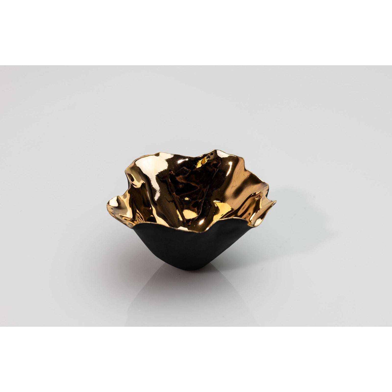 PL01 Tulip 1, black porcelain and gold lustre by Penny Little. Available at Padstow Gallery, Cornwall