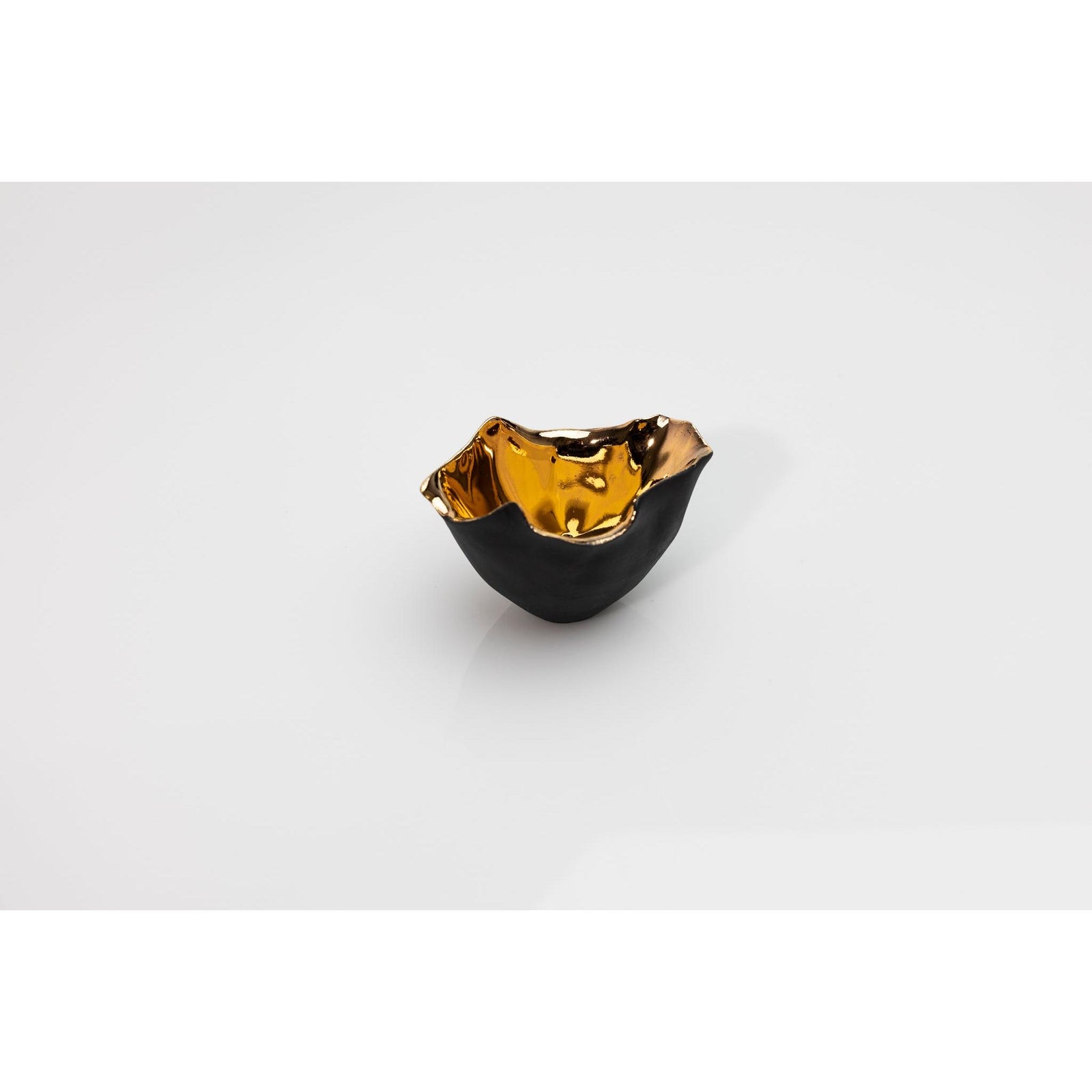 PL02 Tulip 2, black porcelain and gold lustre by Penny Little. Available at Padstow Gallery, Cornwall