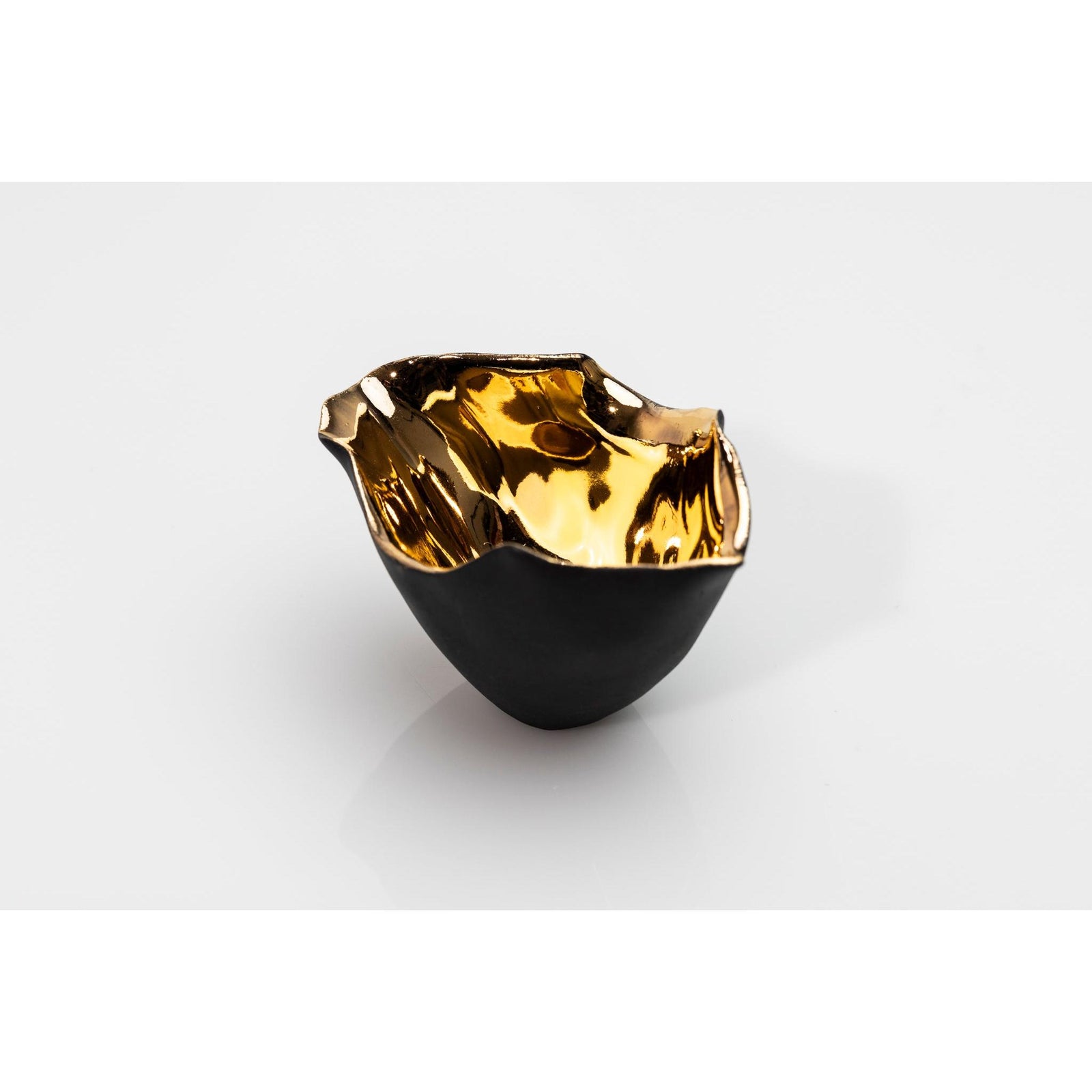 PL02 Tulip 2, black porcelain and gold lustre by Penny Little. Available at Padstow Gallery, Cornwall