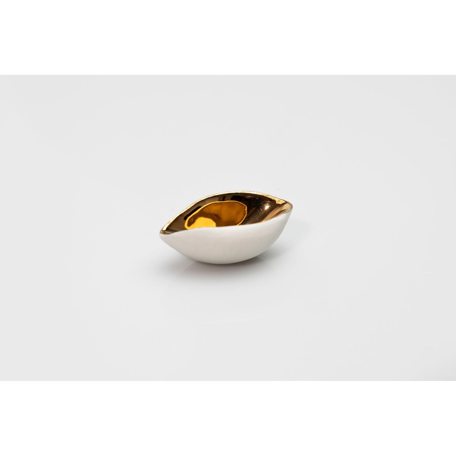 PL09 Miniature Scoop, white porcelain and gold lustre by Penny Little. Available at Padstow Gallery, Cornwall