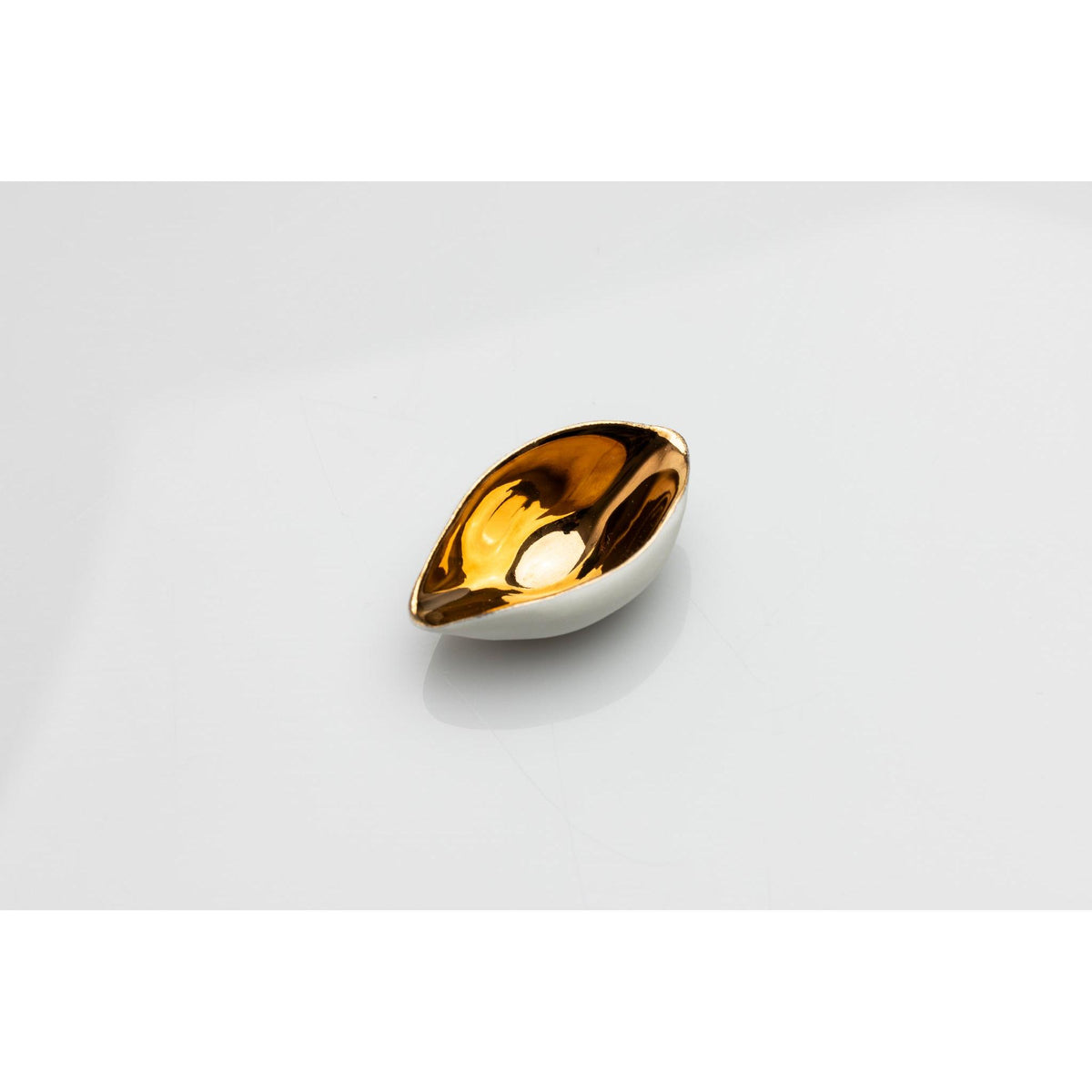 PL09 Miniature Scoop, white porcelain and gold lustre by Penny Little. Available at Padstow Gallery, Cornwall