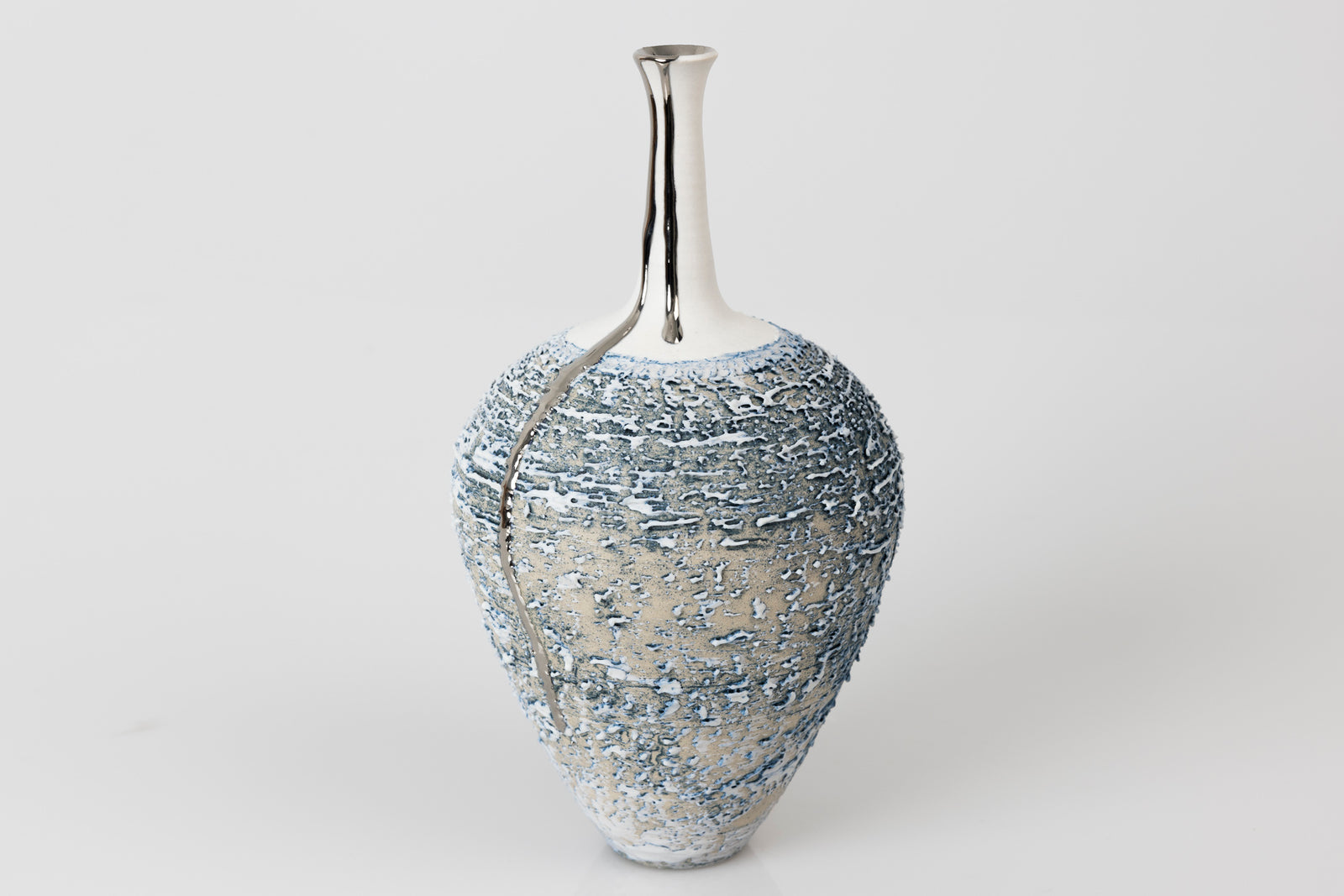 PGX39 Textured long necked vase with Platinum Lustre by Alex McCarthy available at Padstow Gallery