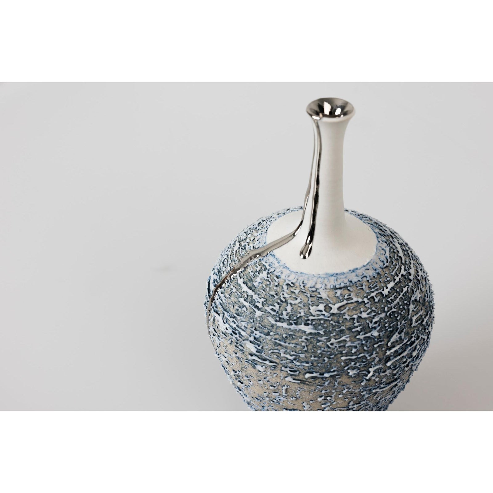 PGX39 Textured long necked vase with Platinum Lustre by Alex McCarthy available at Padstow Gallery