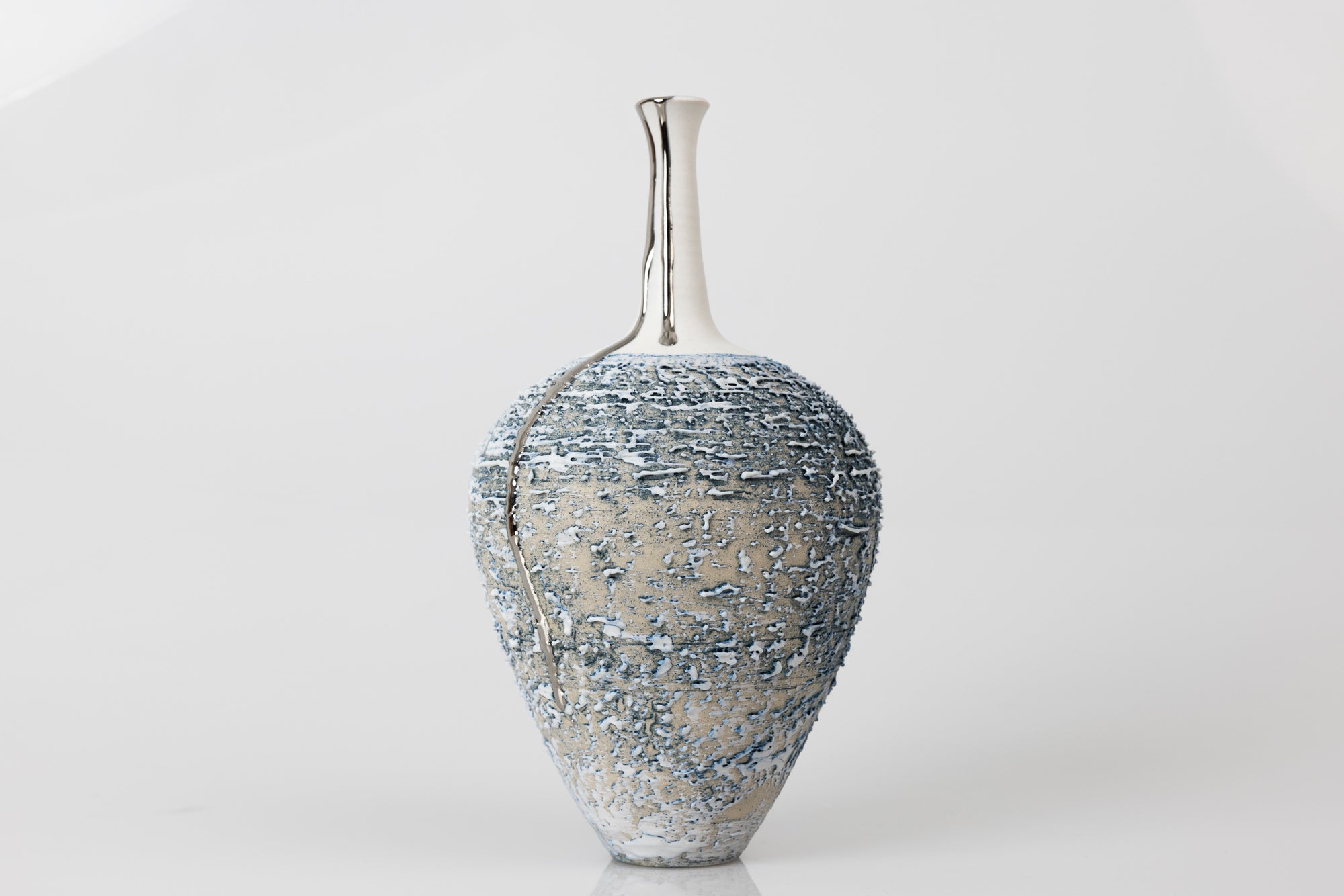 PGX39 Textured long necked vase with Platinum Lustre by Alex McCarthy available at Padstow Gallery