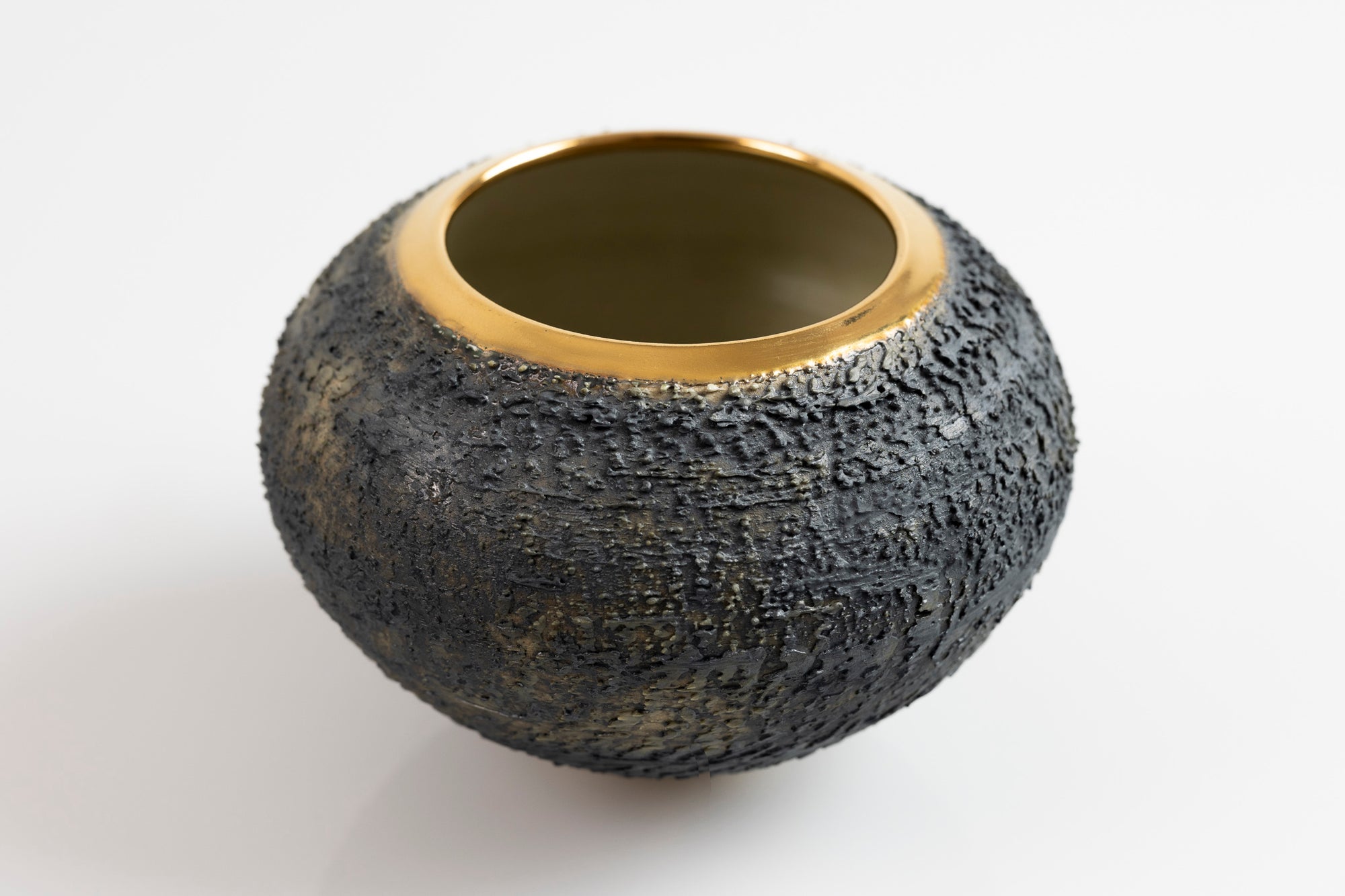 Textured vase with gold lustre rim, by Alex McCarthy, available at Padstow Gallery, Cornwall