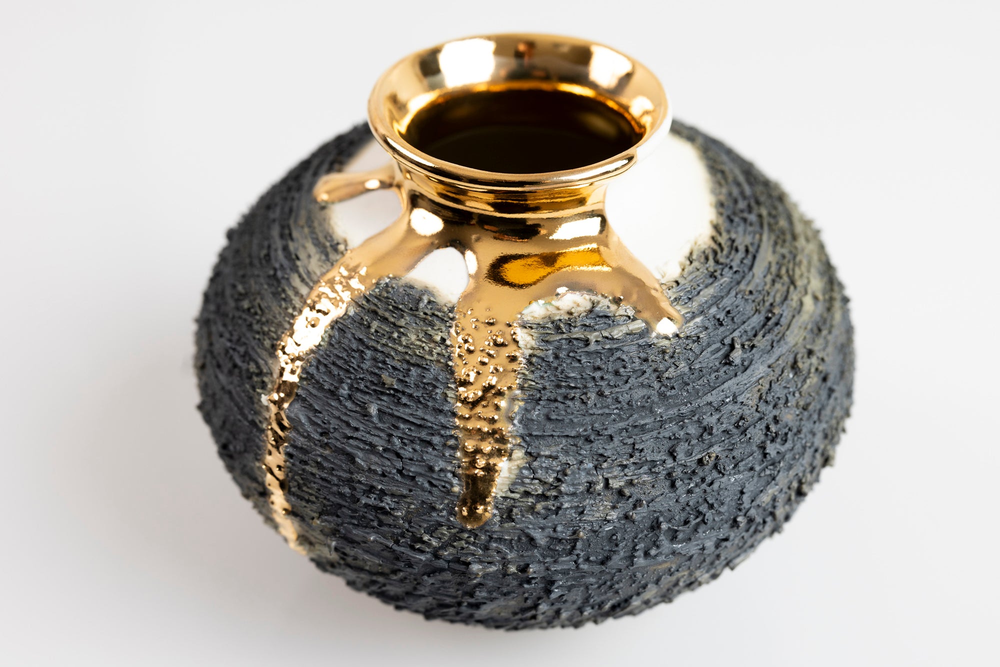 Textured vase with gold lustre, by Alex McCarthy, available at Padstow Gallery, Cornwall