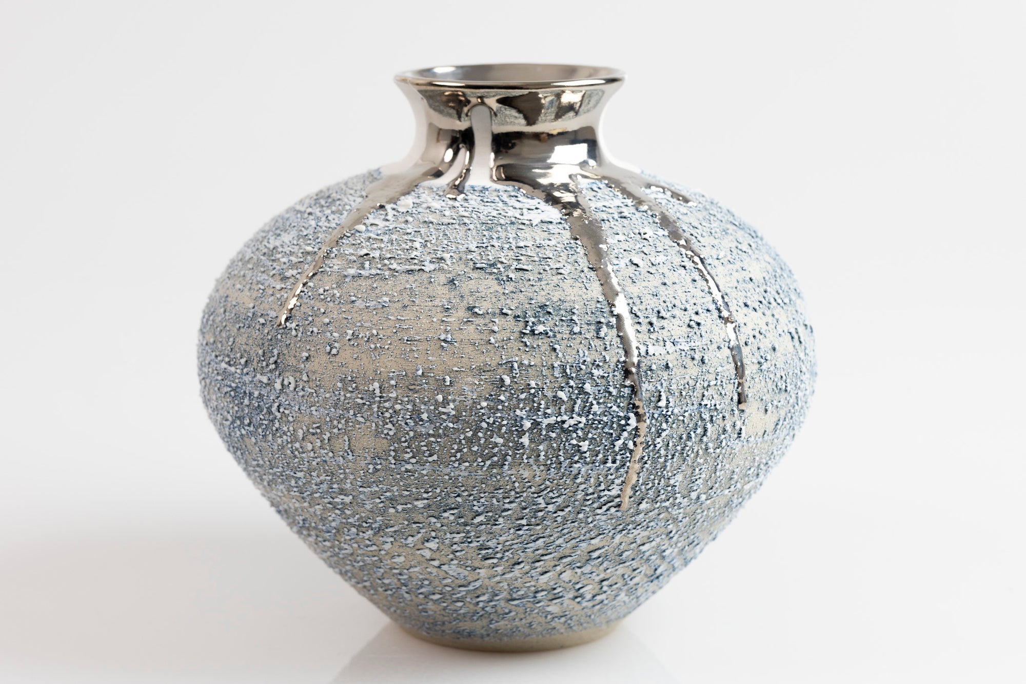 Textured vase with platinum lustre, by Alex McCarthy, available from Padstow Gallery, Cornwall