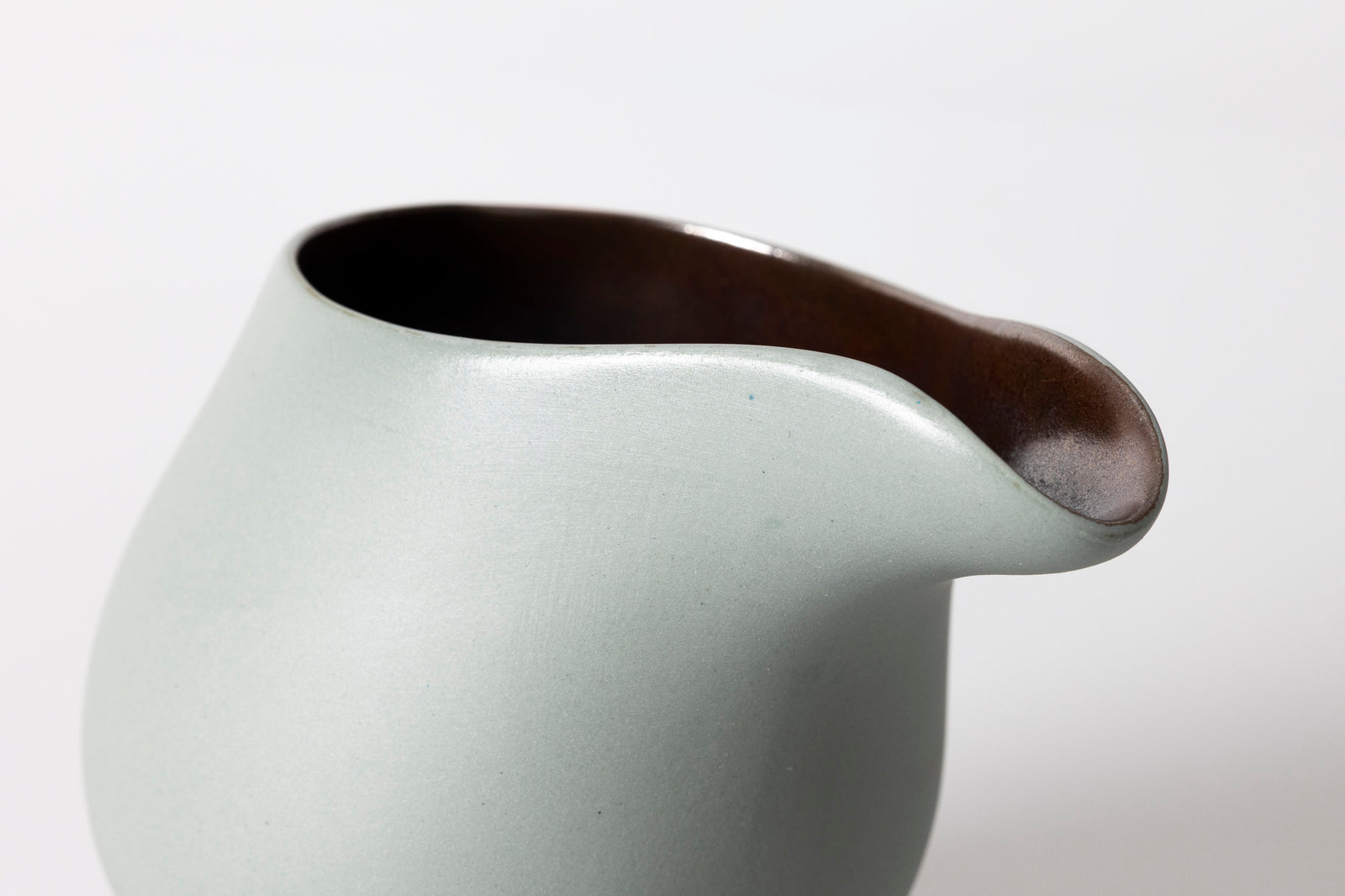 Sage green flow jug by Kate Schuricht ceramics, available at Padstow Gallery Cornwall
