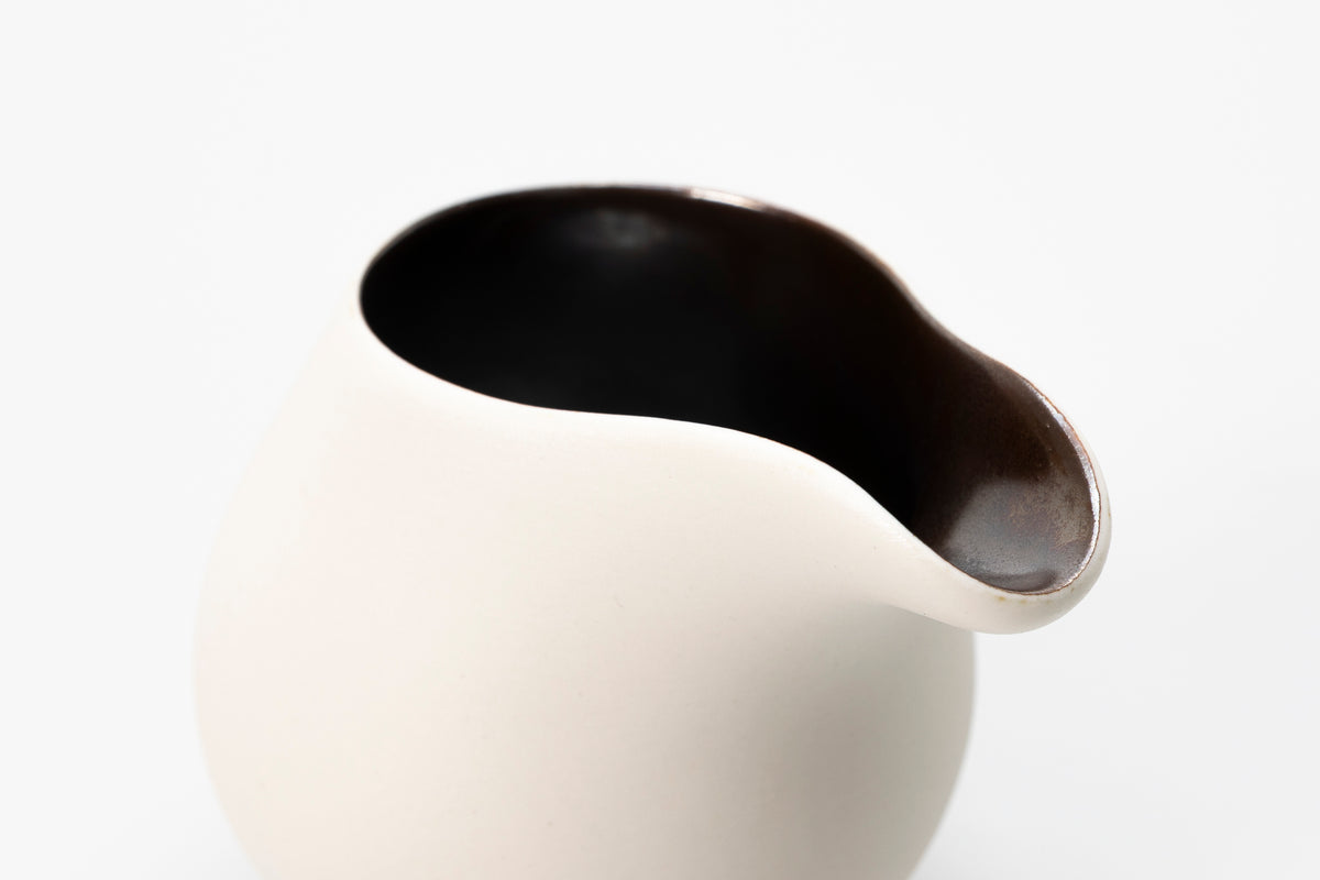 White flow jug by Kate Schuricht ceramics, available at Padstow Gallery Cornwall