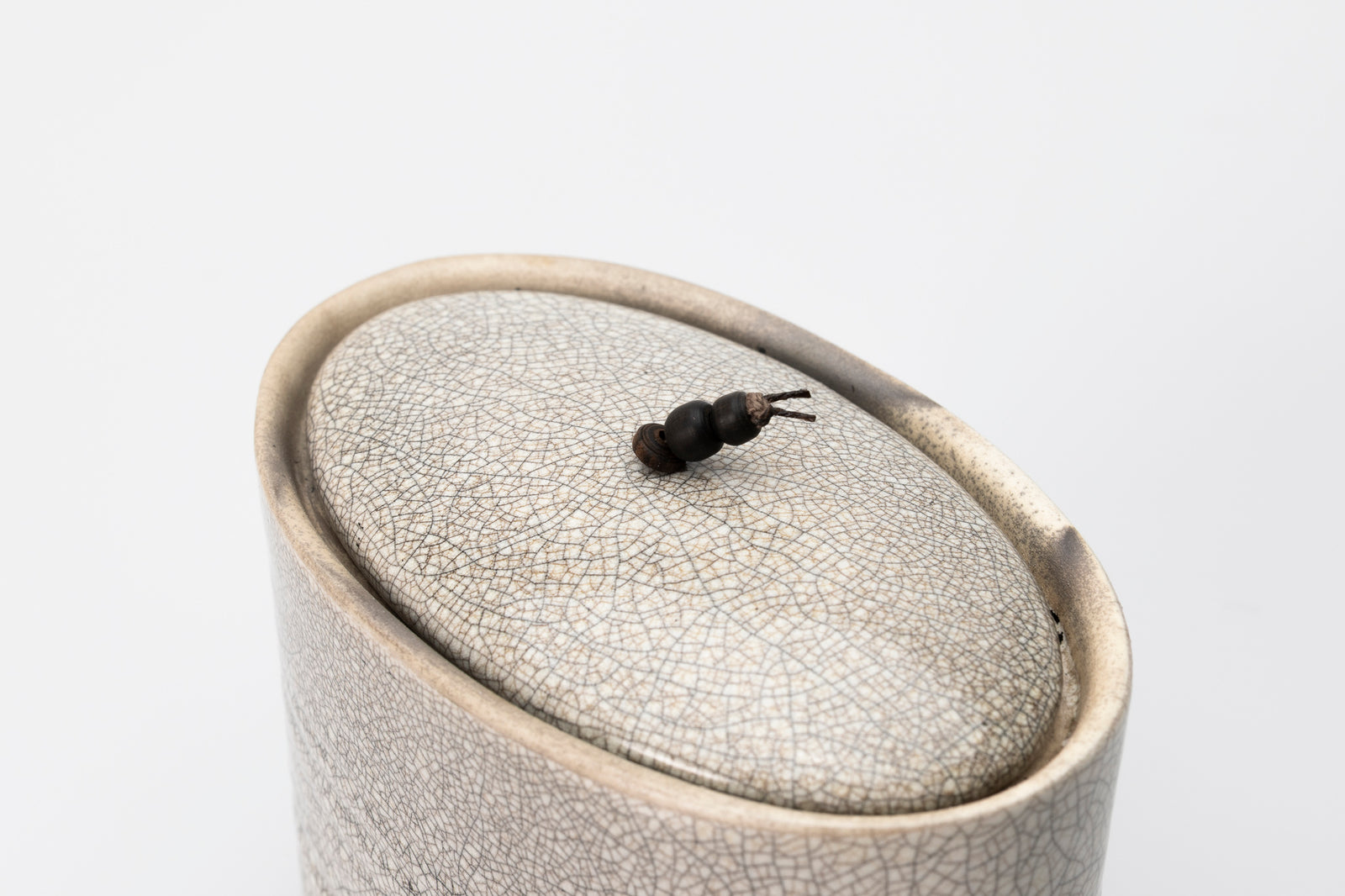 Raku oval container by Kate Schuricht ceramics, available at Padstow Gallery Cornwall