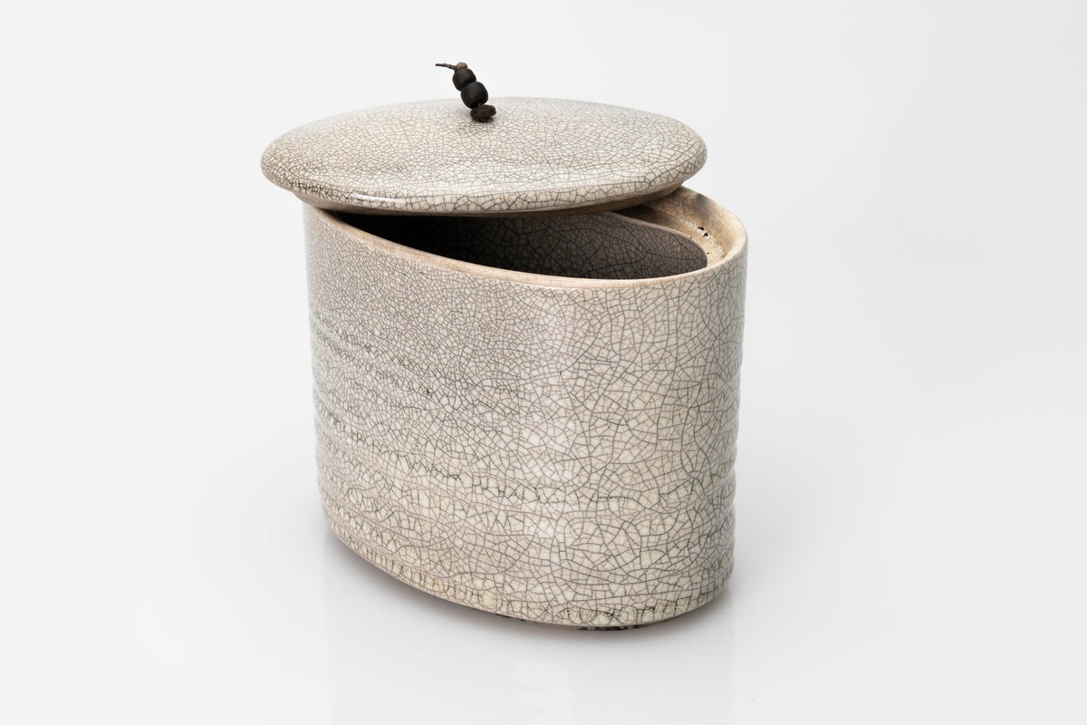 Raku oval container by Kate Schuricht ceramics, available at Padstow Gallery Cornwall