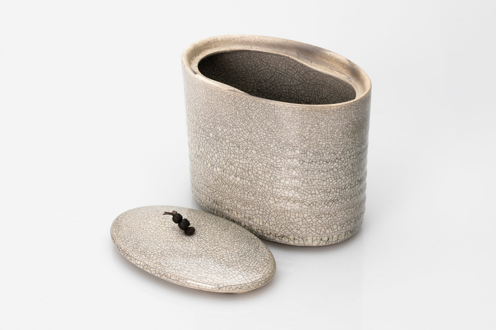 Raku oval container by Kate Schuricht ceramics, available at Padstow Gallery Cornwall