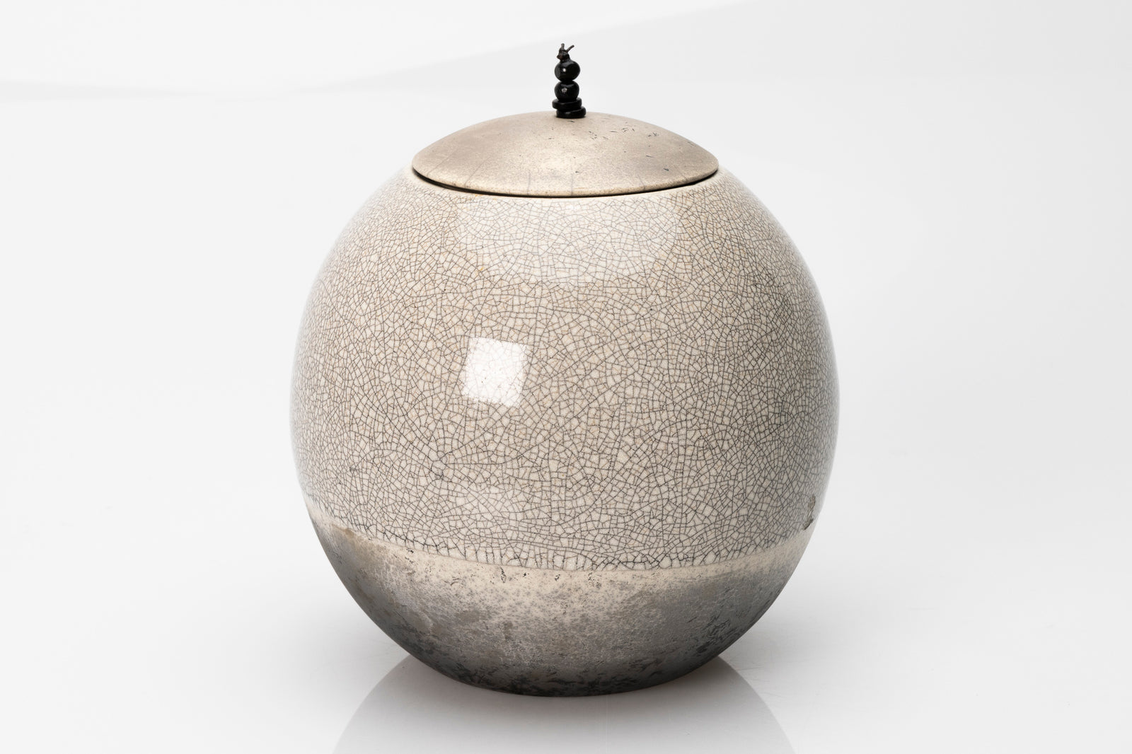 Raku Luna Sphere pot by Kate Schuricht ceramics, available at Padstow Gallery Cornwall