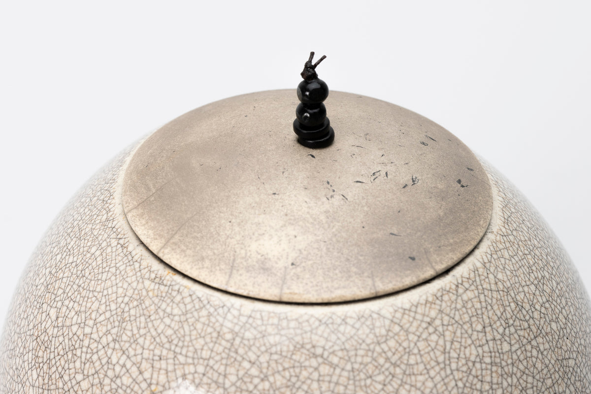 Raku Luna Sphere pot by Kate Schuricht ceramics, available at Padstow Gallery Cornwall