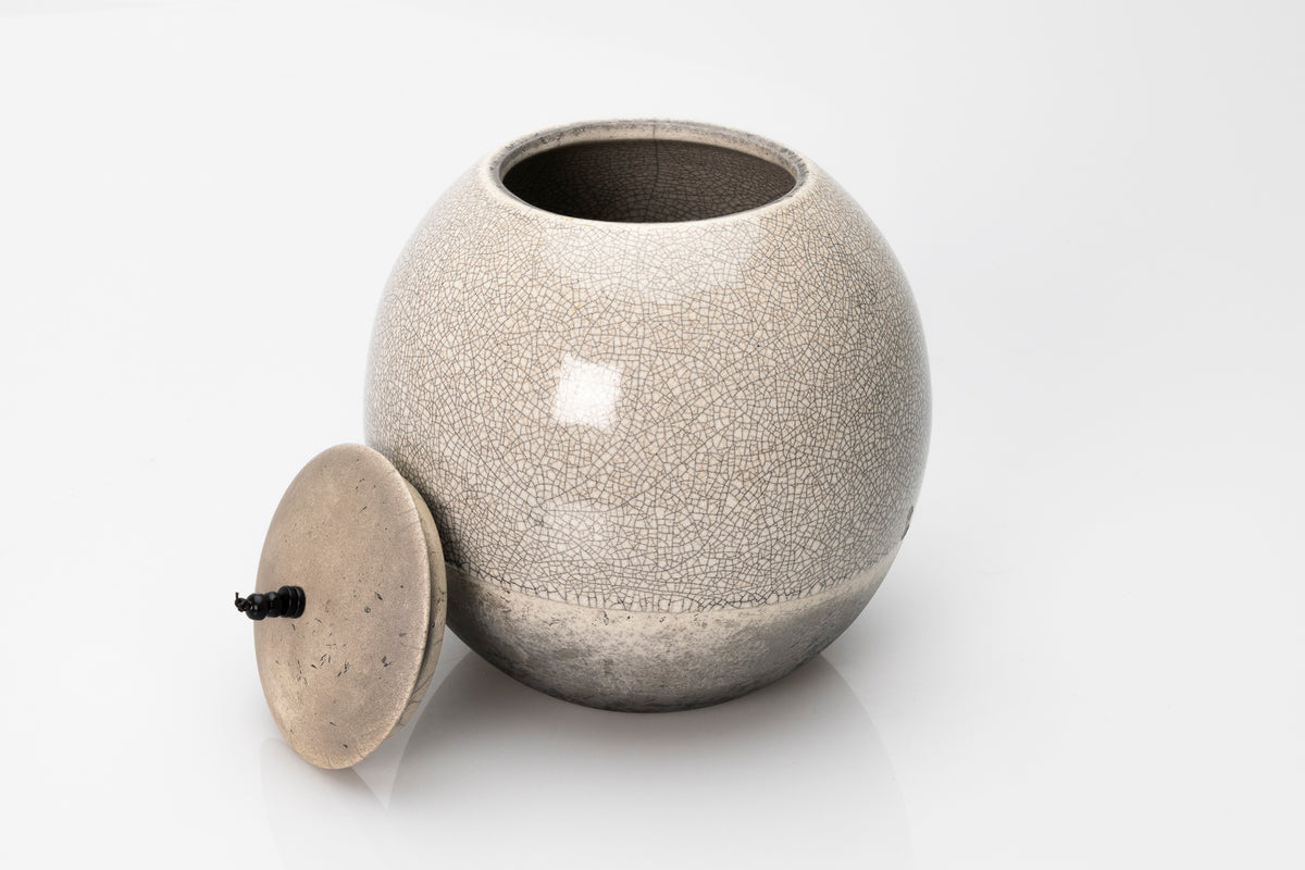 Raku Luna Sphere pot by Kate Schuricht ceramics, available at Padstow Gallery Cornwall