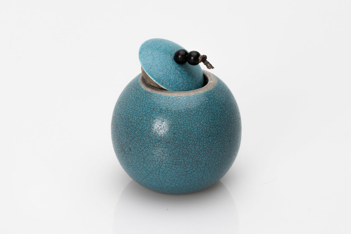 Raku Luna Sphere pot by Kate Schuricht ceramics, available at Padstow Gallery Cornwall