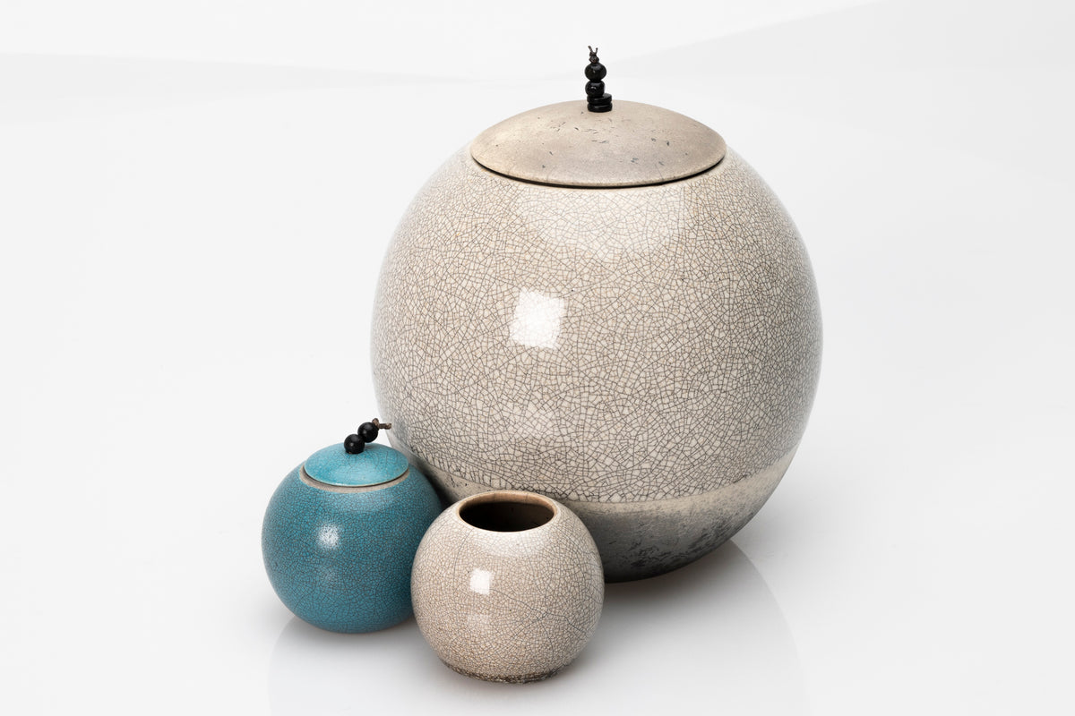 Raku Luna Sphere pot by Kate Schuricht ceramics, available at Padstow Gallery Cornwall