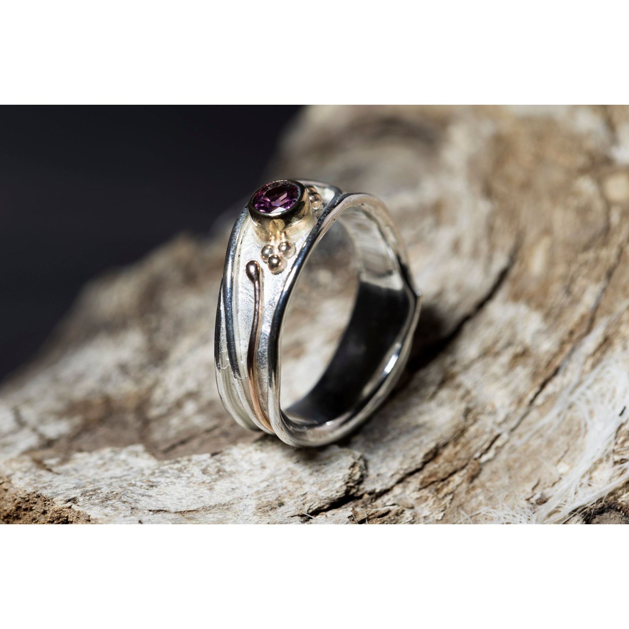 'LG111 Silver and 9ct Gold 4mm Rhodalite Garnet Ring' by Les Grimshaw, available at Padstow Gallery, Cornwall