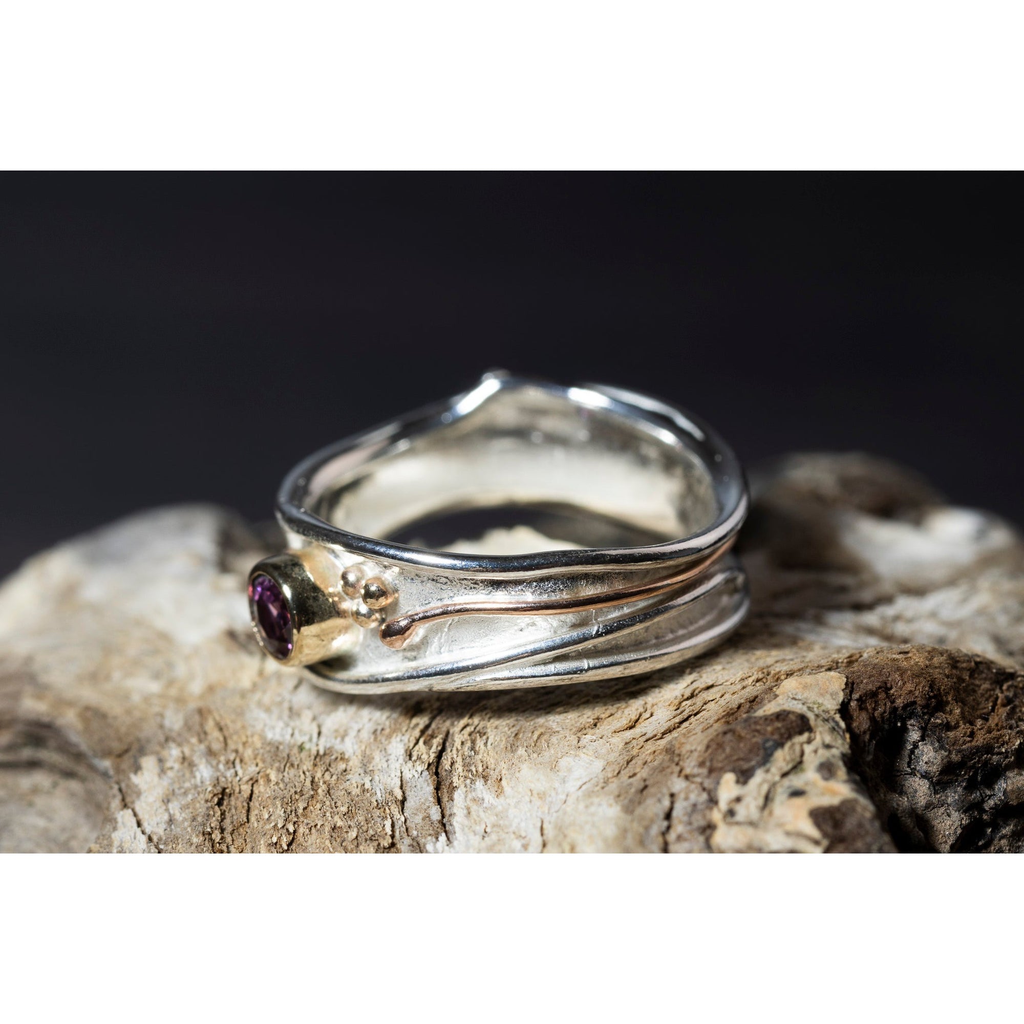 'LG111 Silver and 9ct Gold 4mm Rhodalite Garnet Ring' by Les Grimshaw, available at Padstow Gallery, Cornwall