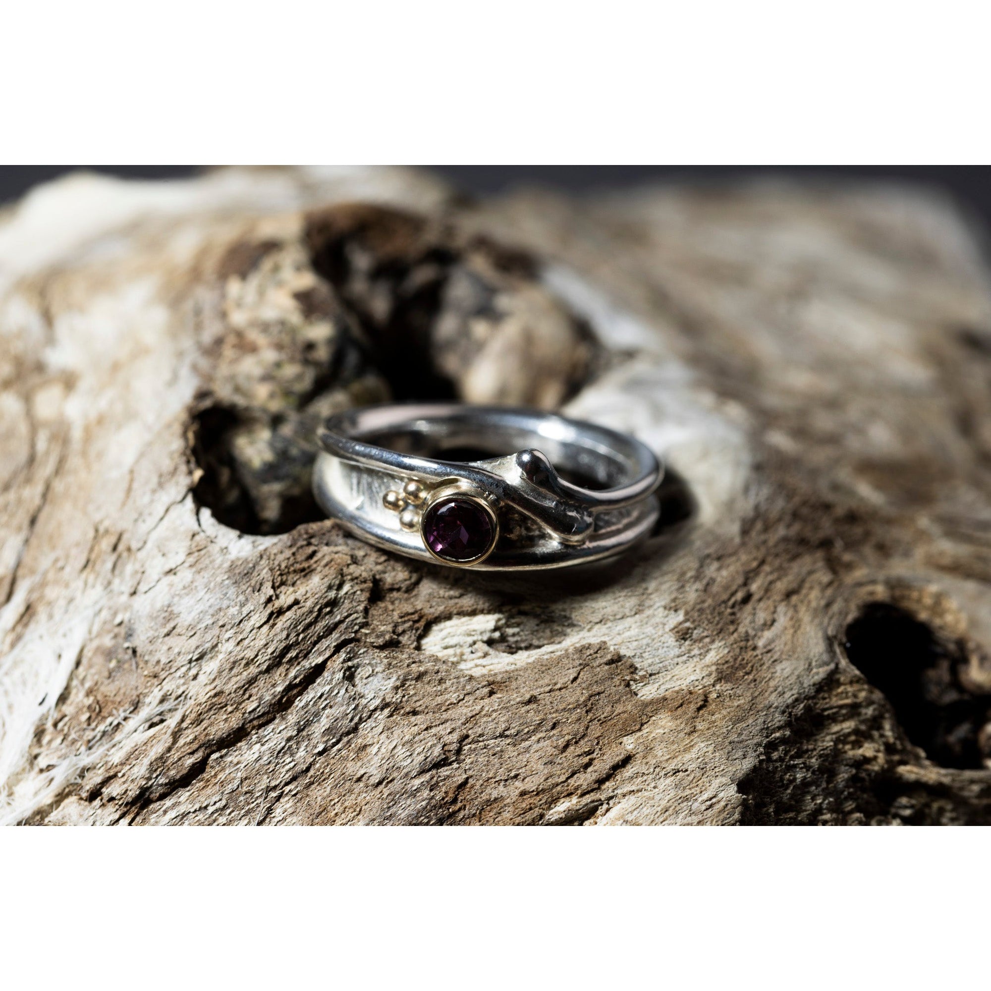 'LG110 Silver and 9ct Gold 4mm Rhodalite Garnet Ring' by Les Grimshaw, available at Padstow Gallery, Cornwall