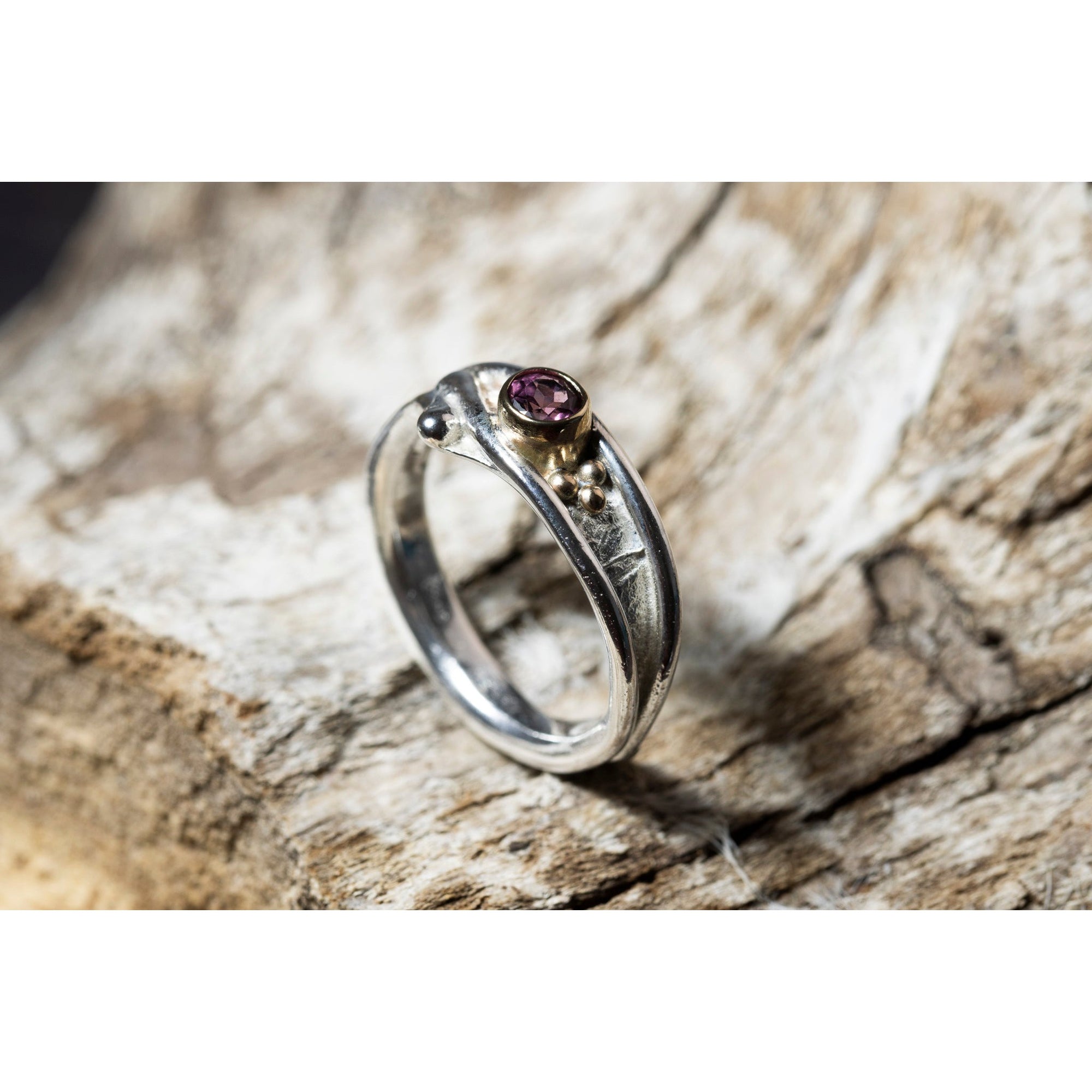 'LG110 Silver and 9ct Gold 4mm Rhodalite Garnet Ring' by Les Grimshaw, available at Padstow Gallery, Cornwall