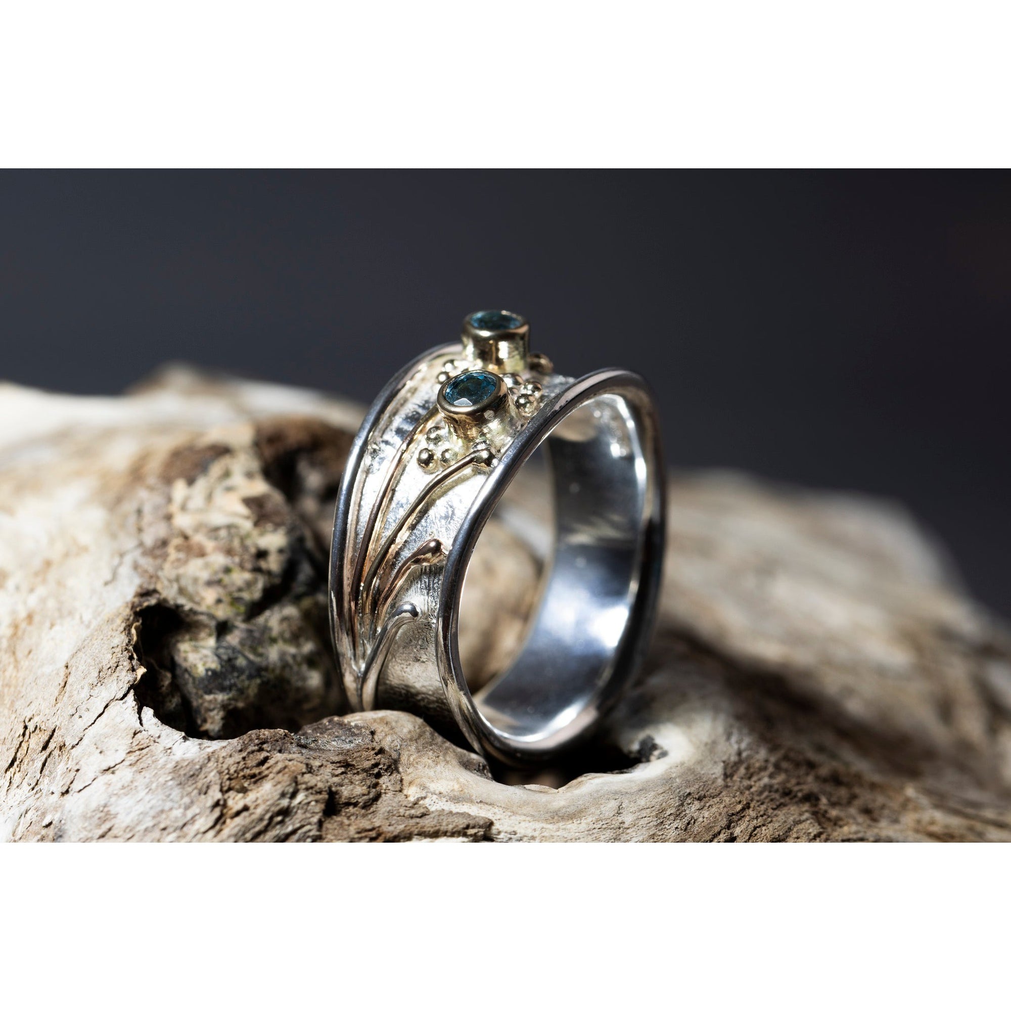 'LG113 Silver and 9ct Gold 2 x Swiss Blue Topaz Ring' by Les Grimshaw, available at Padstow Gallery, Cornwall