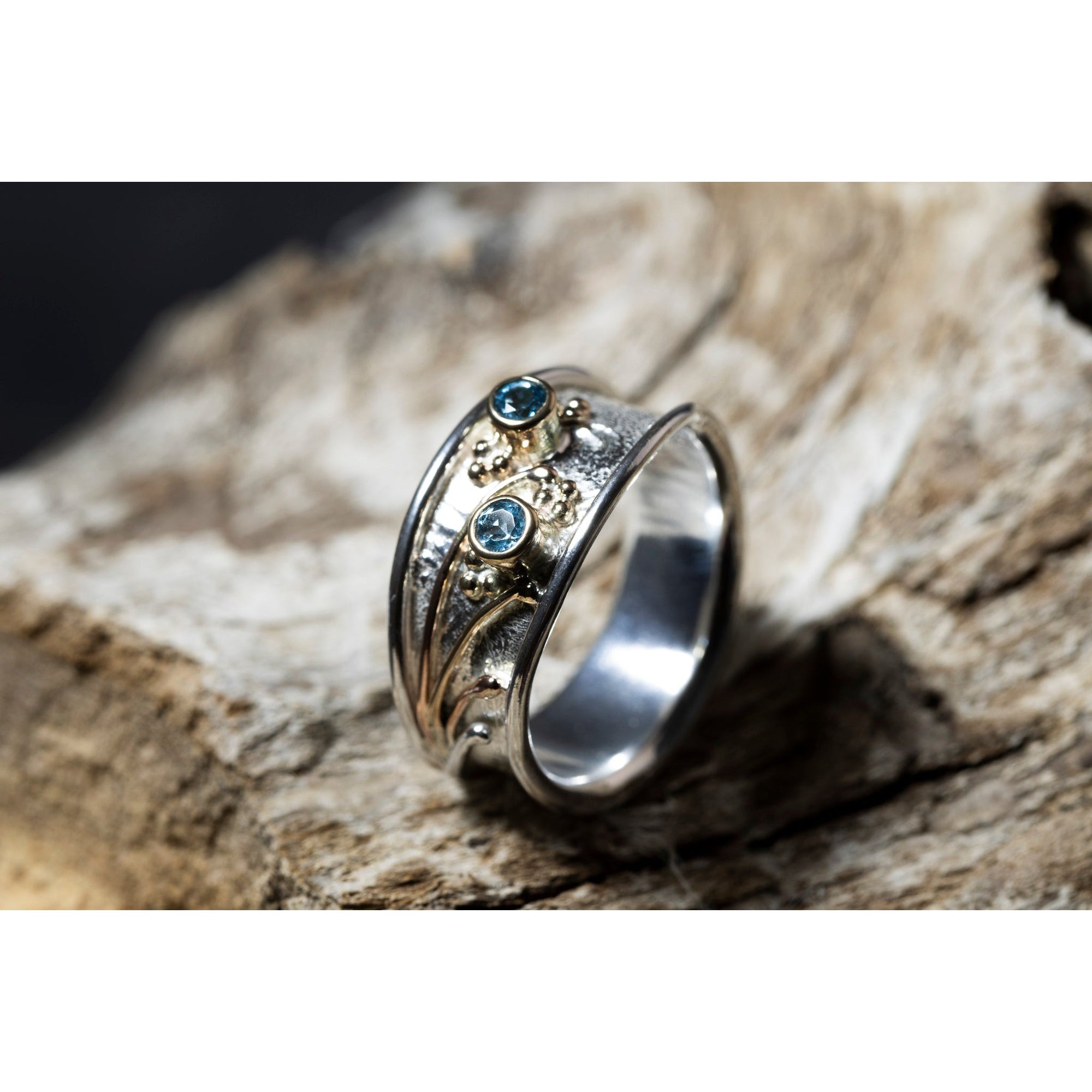 'LG113 Silver and 9ct Gold 2 x Swiss Blue Topaz Ring' by Les Grimshaw, available at Padstow Gallery, Cornwall