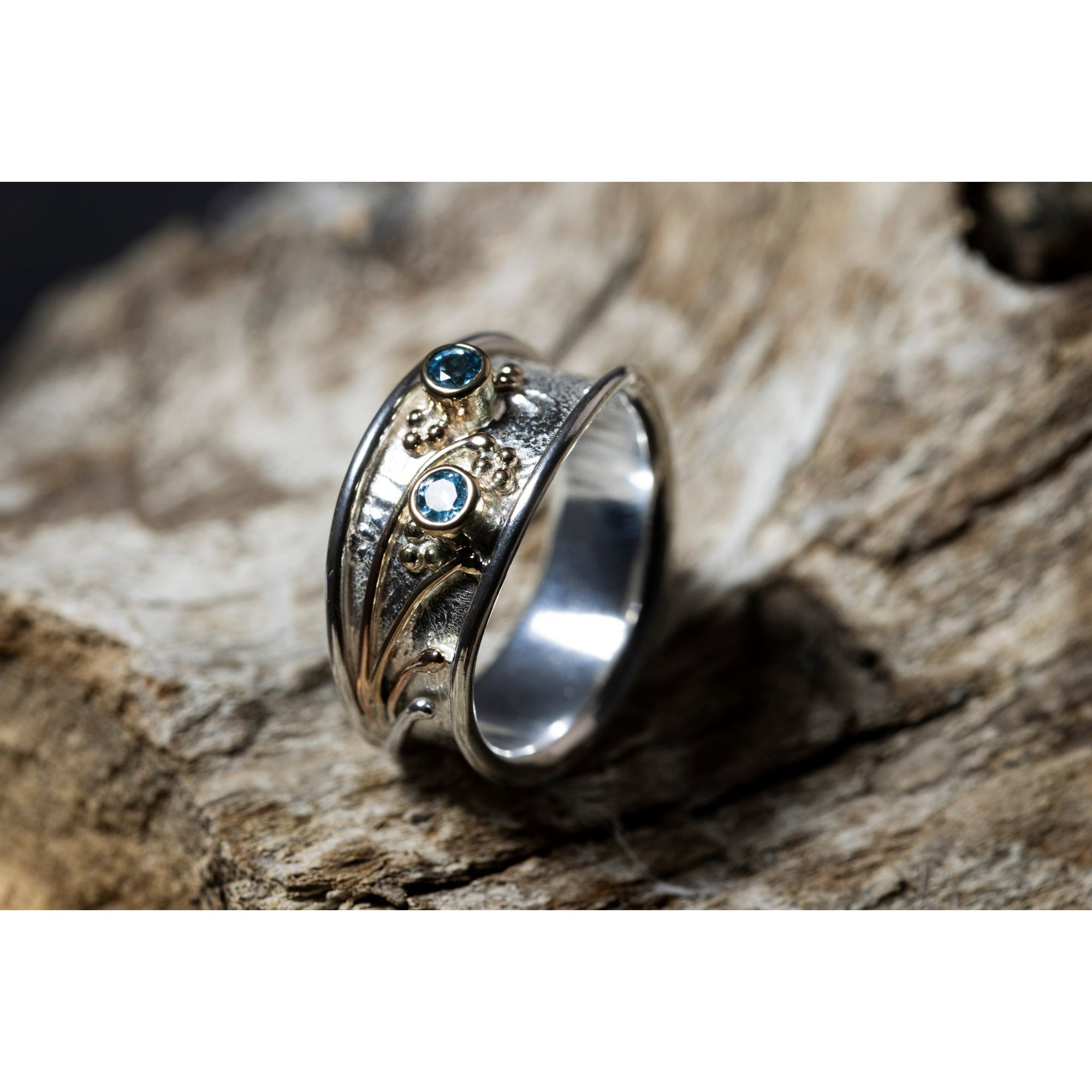 'LG113 Silver and 9ct Gold 2 x Swiss Blue Topaz Ring' by Les Grimshaw, available at Padstow Gallery, Cornwall