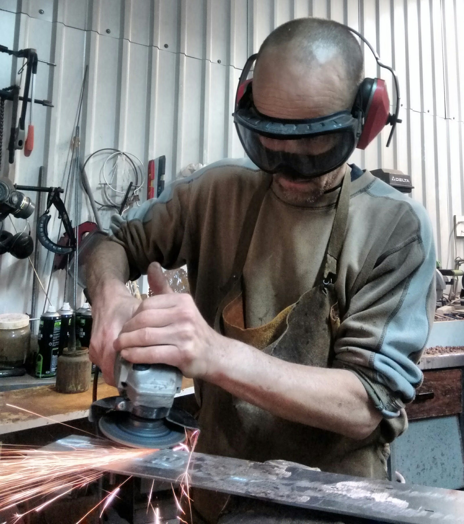 David Mayne sculptor in his studio