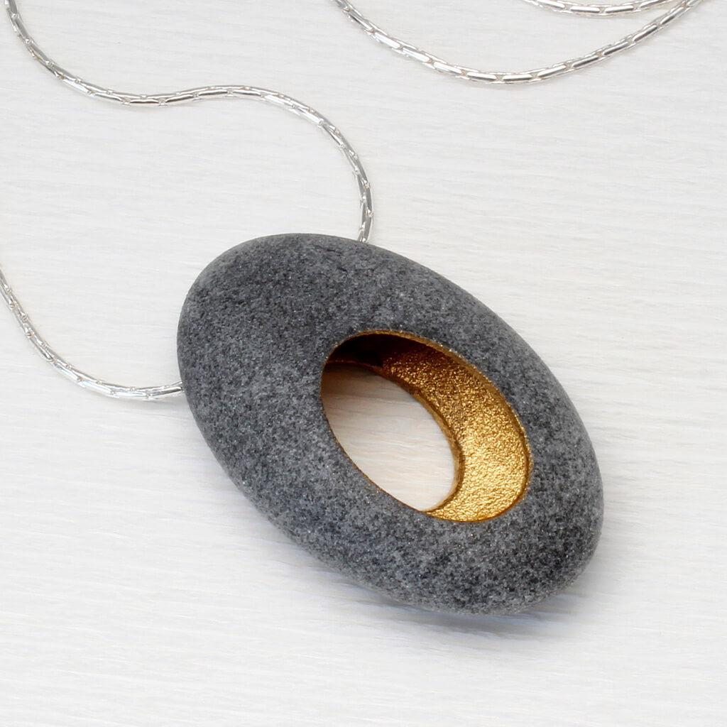 JDF8 Hollow Pebble Pendant by John and Dawn Field, available at Padstow Gallery, Cornwall