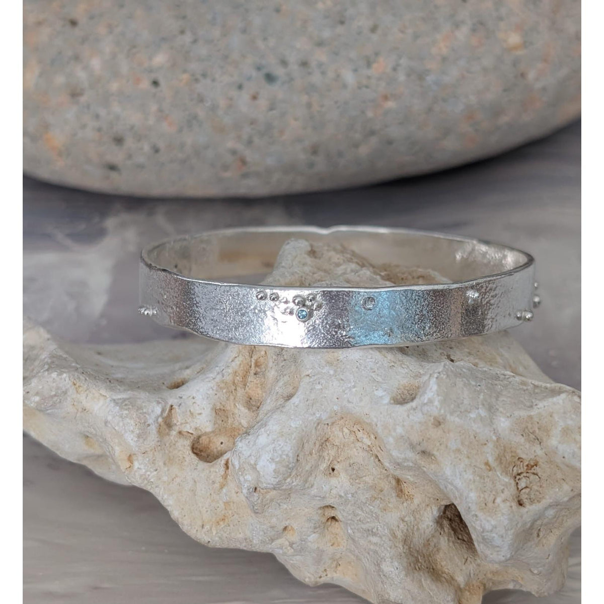 SA B39 Organic Silver Bangle with London Blue Topaz by Sandra Austin jewellery, available at Padstow Gallery, Cornwall
