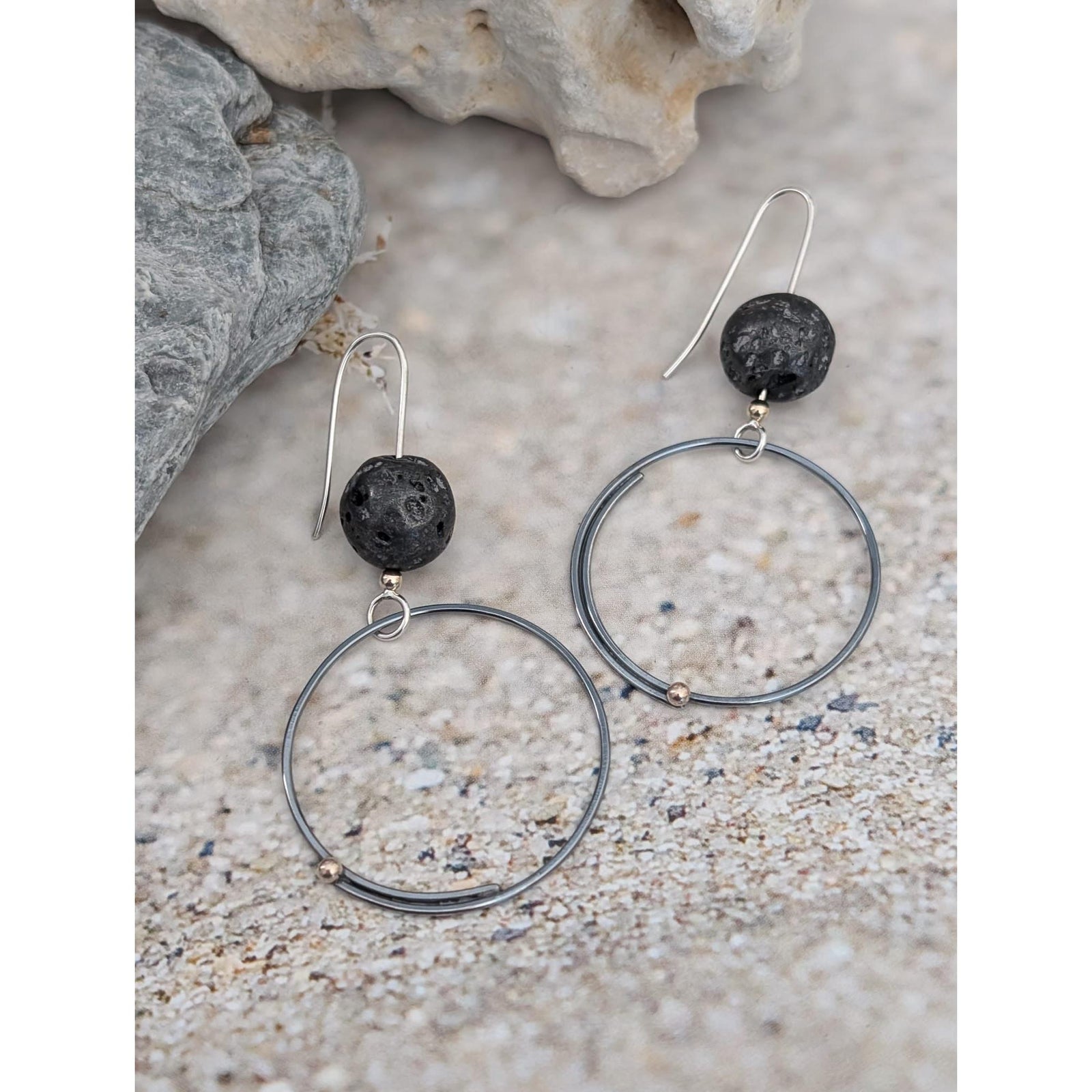 SA Ea341 drop hoop earrings with lava bead by Sandra Austin jewellery, available at Padstow Gallery, Cornwall