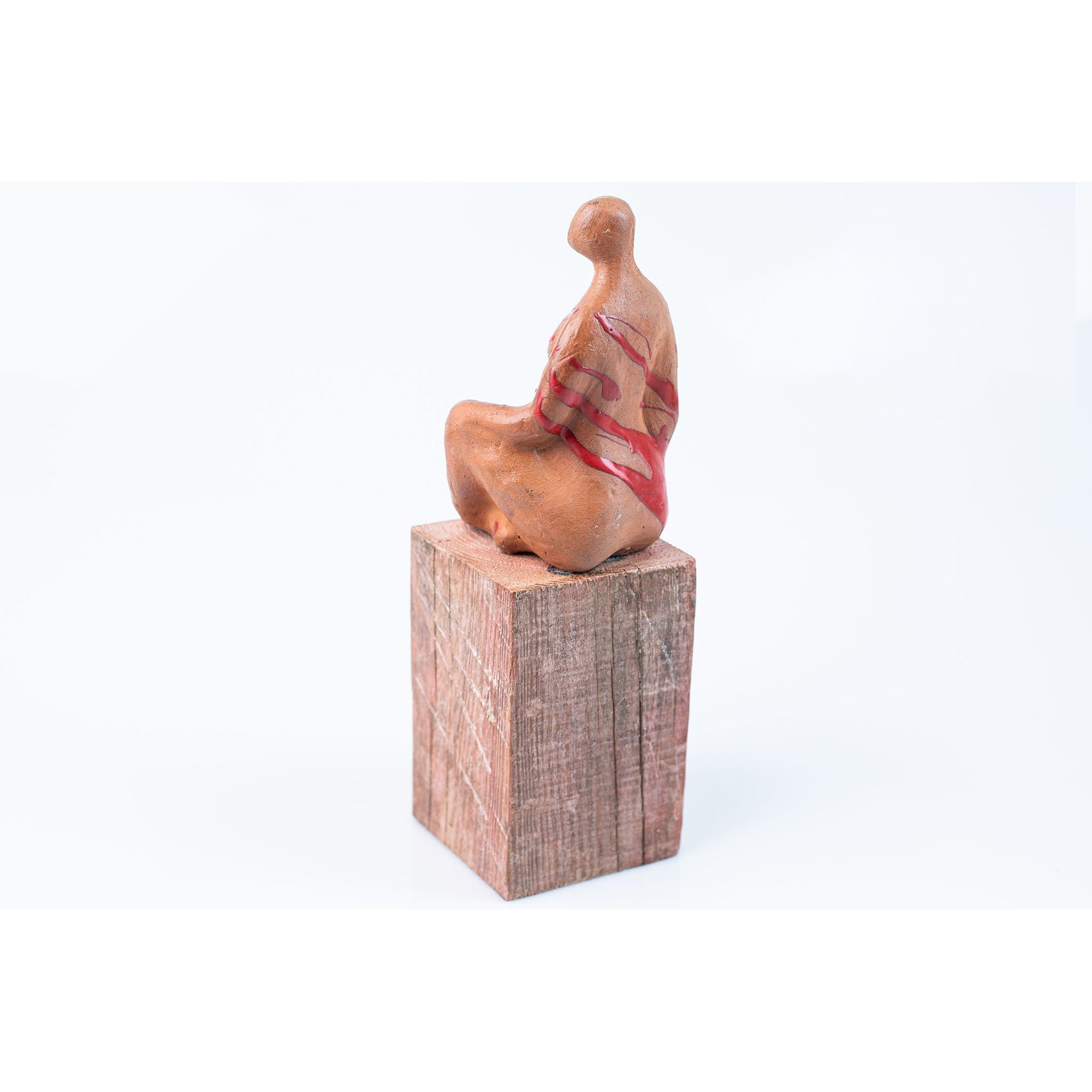 'Fem' seated figure on timber plinth, by Sophie Howard, available from Padstow Gallery, Cornwall