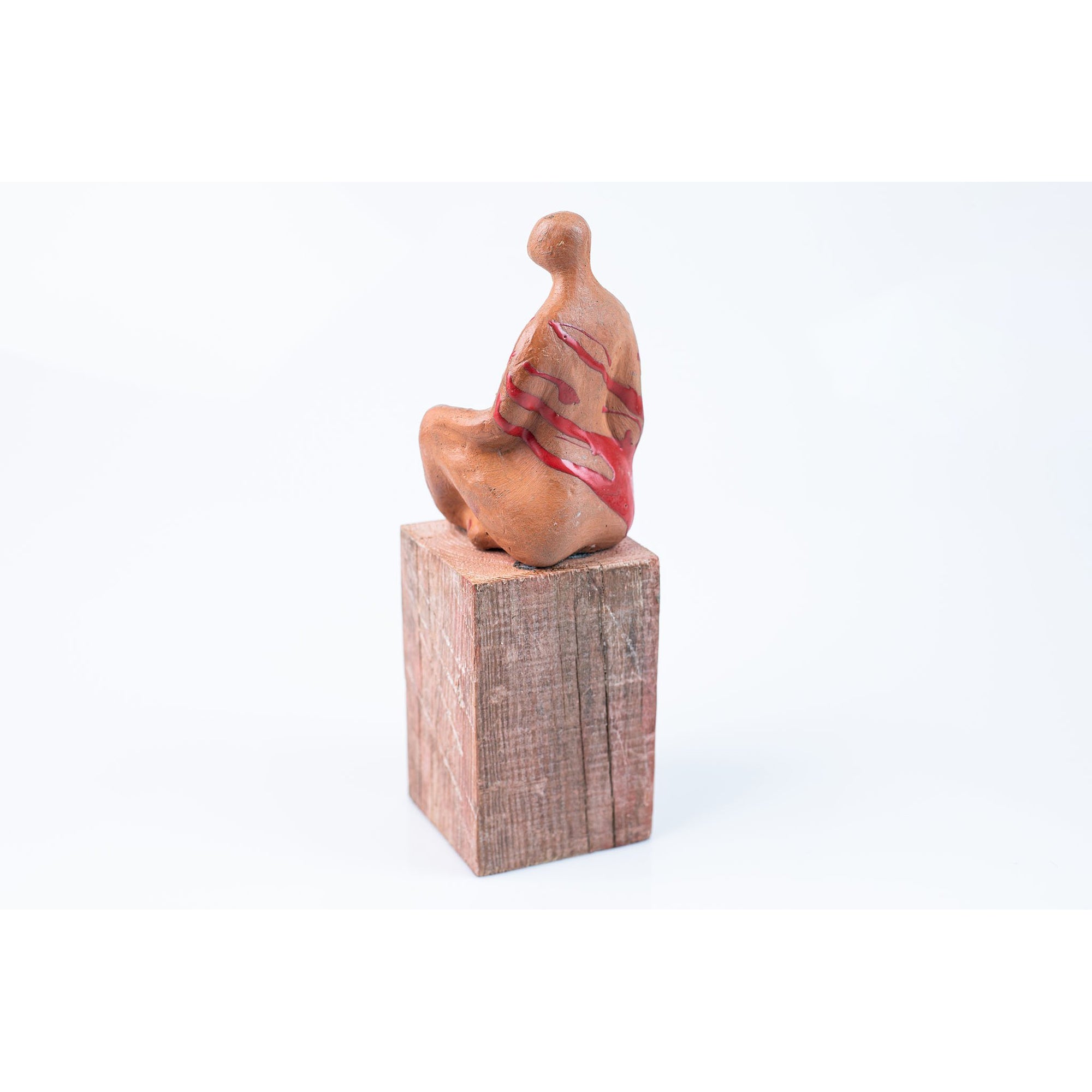 'Fem' seated figure on timber plinth, by Sophie Howard, available from Padstow Gallery, Cornwall