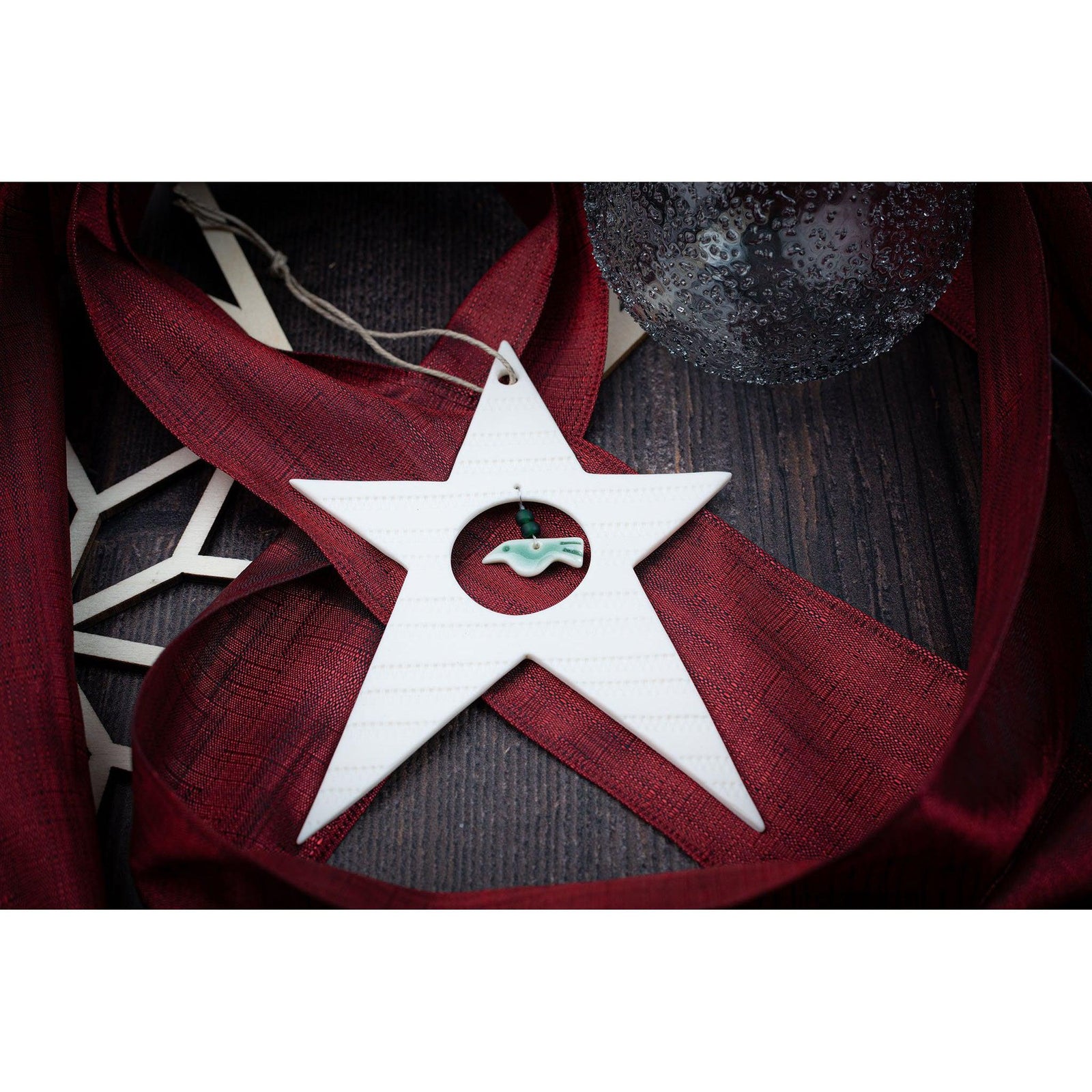Porcelain Star Decoration by Rhian Winslade, available at Padstow Gallery, Cornwall
