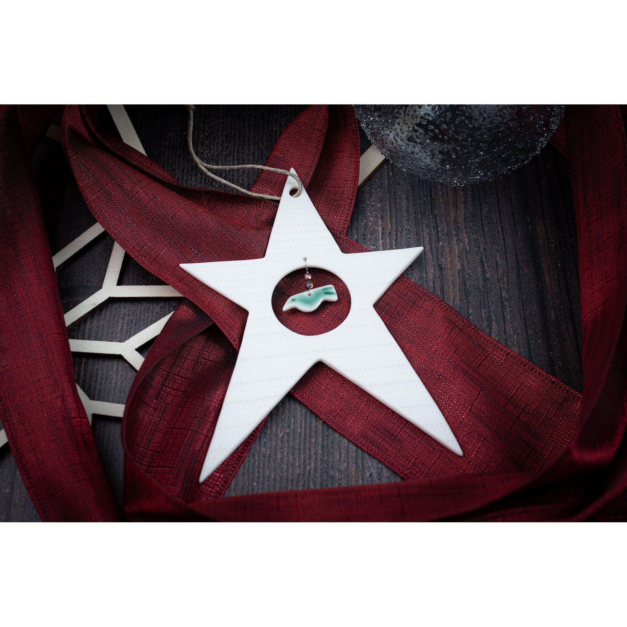 Porcelain Star Decoration by Rhian Winslade, available at Padstow Gallery, Cornwall