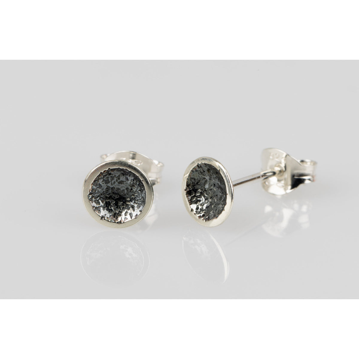 &#39;SA Ea49 Domed oxidised textured studs&#39; by Sandra Austin jewellery, available at Padstow Gallery, Cornwall