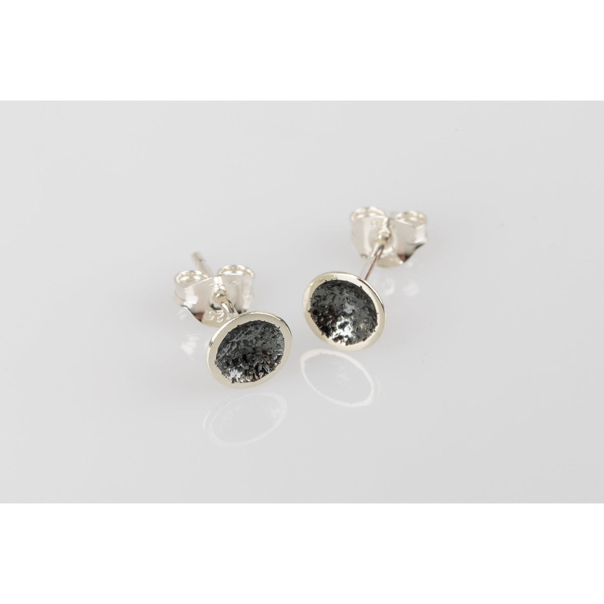 'SA Ea49 Domed oxidised textured studs' by Sandra Austin jewellery, available at Padstow Gallery, Cornwall