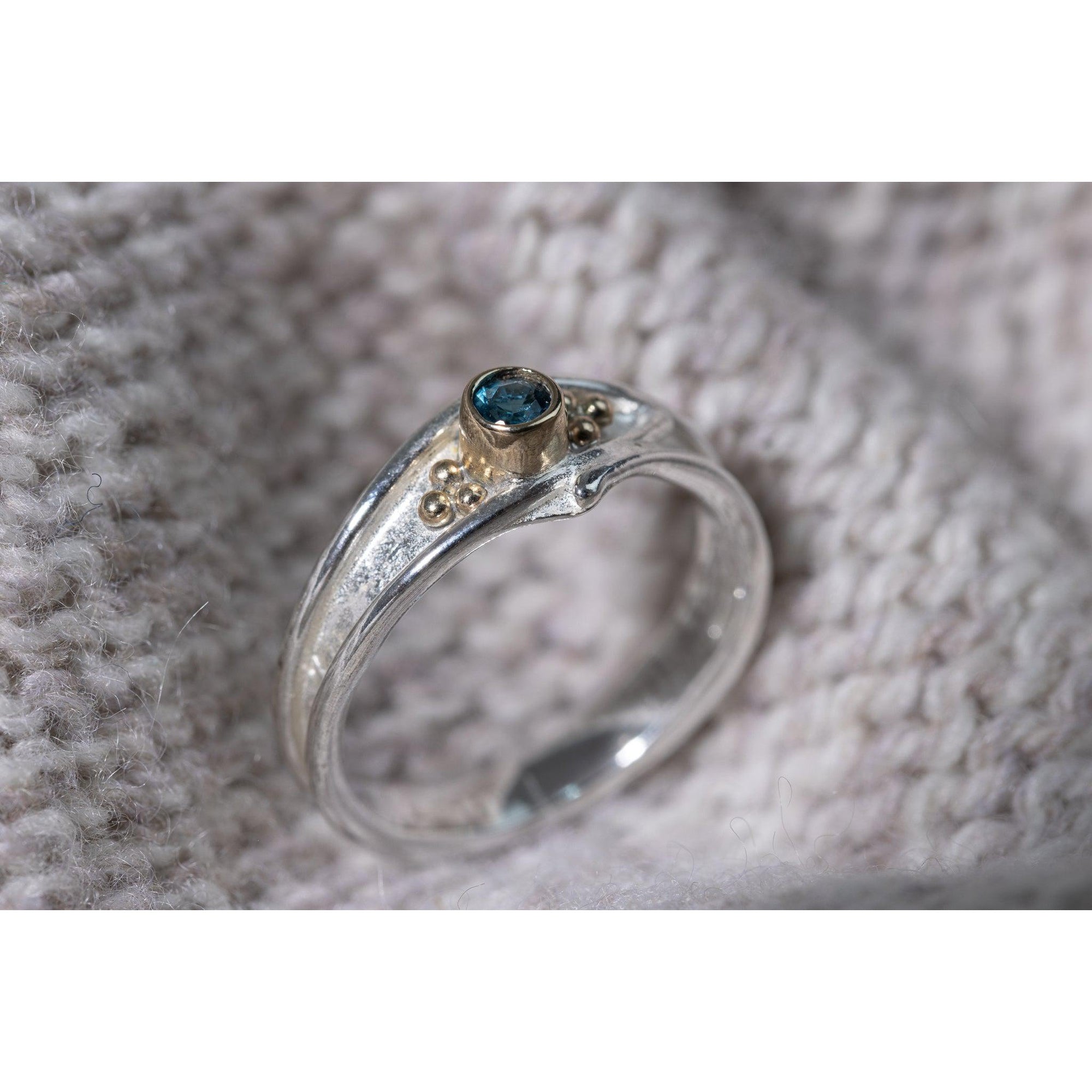 'LG63 - Silver Ring with 9ct Gold 3mm London Blue Topaz Ring ' by Les Grimshaw, available at Padstow Gallery, Cornwall