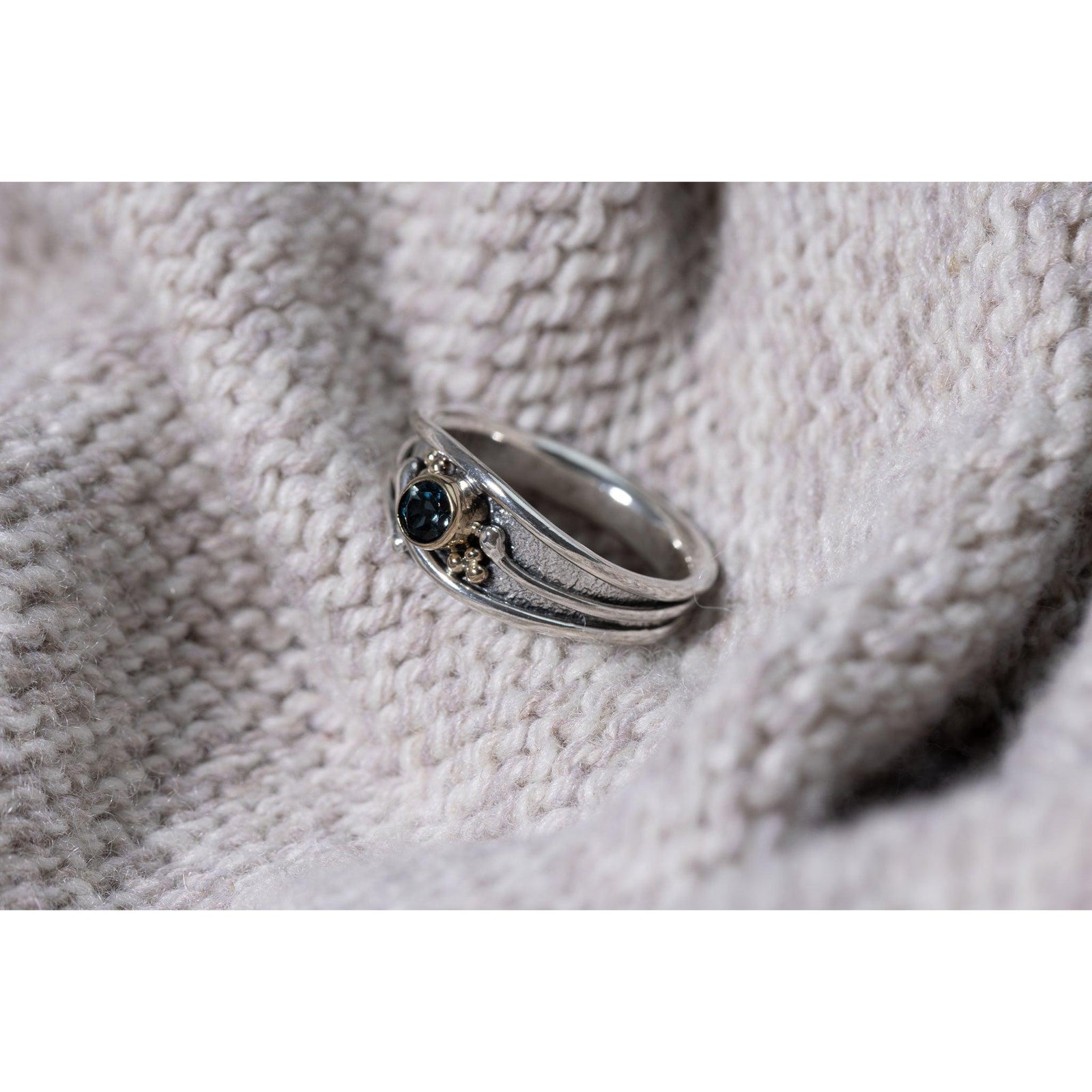 'LG65 - Silver Ring with 9ct Gold 4mm London Blue Topaz Ring ' by Les Grimshaw, available at Padstow Gallery, Cornwall