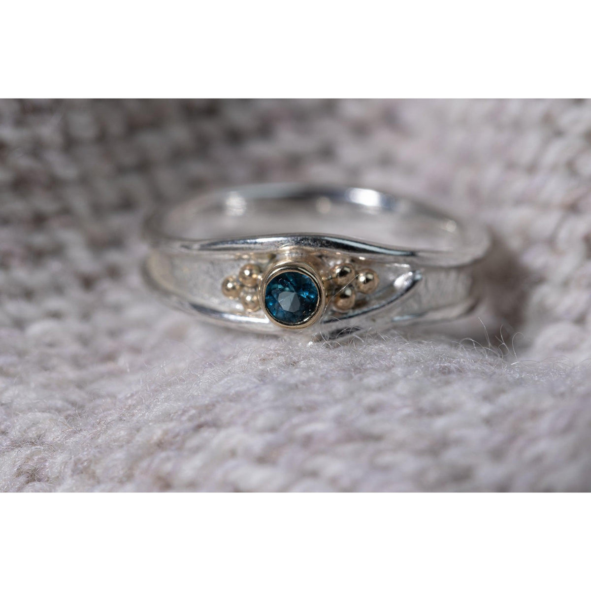 &#39;LG63 - Silver Ring with 9ct Gold 3mm London Blue Topaz Ring &#39; by Les Grimshaw, available at Padstow Gallery, Cornwall