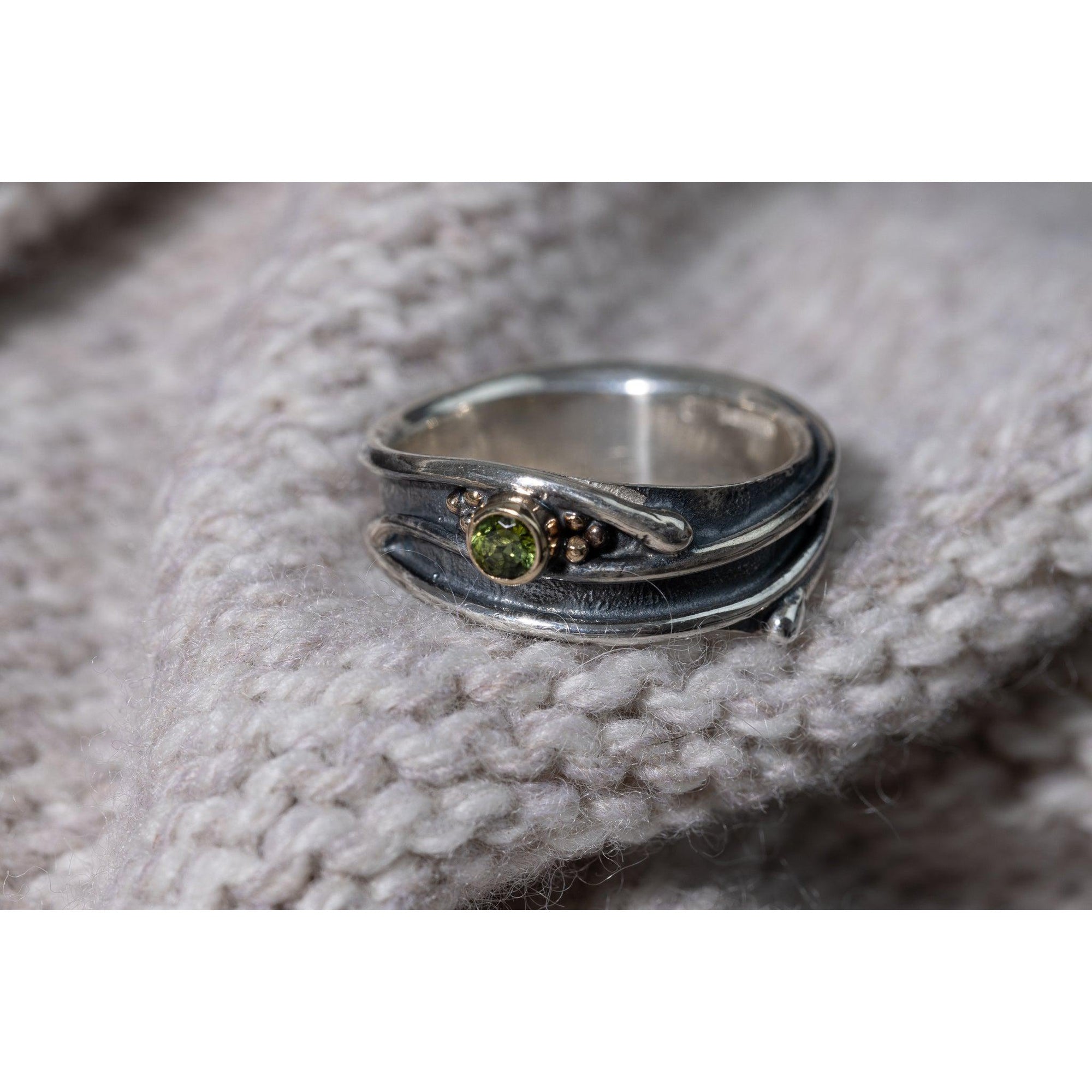 'LG66 - Silver Ring with 9ct Gold 3.5mm Peridot Ring ' by Les Grimshaw, available at Padstow Gallery, Cornwall