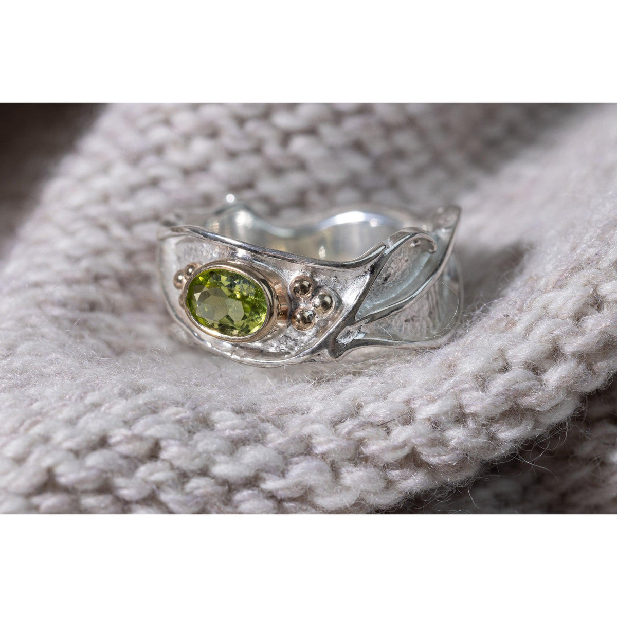 &#39;LG60 - Silver Ring with 9ct Gold 8x5 Peridot Ring &#39; by Les Grimshaw, available at Padstow Gallery, Cornwall